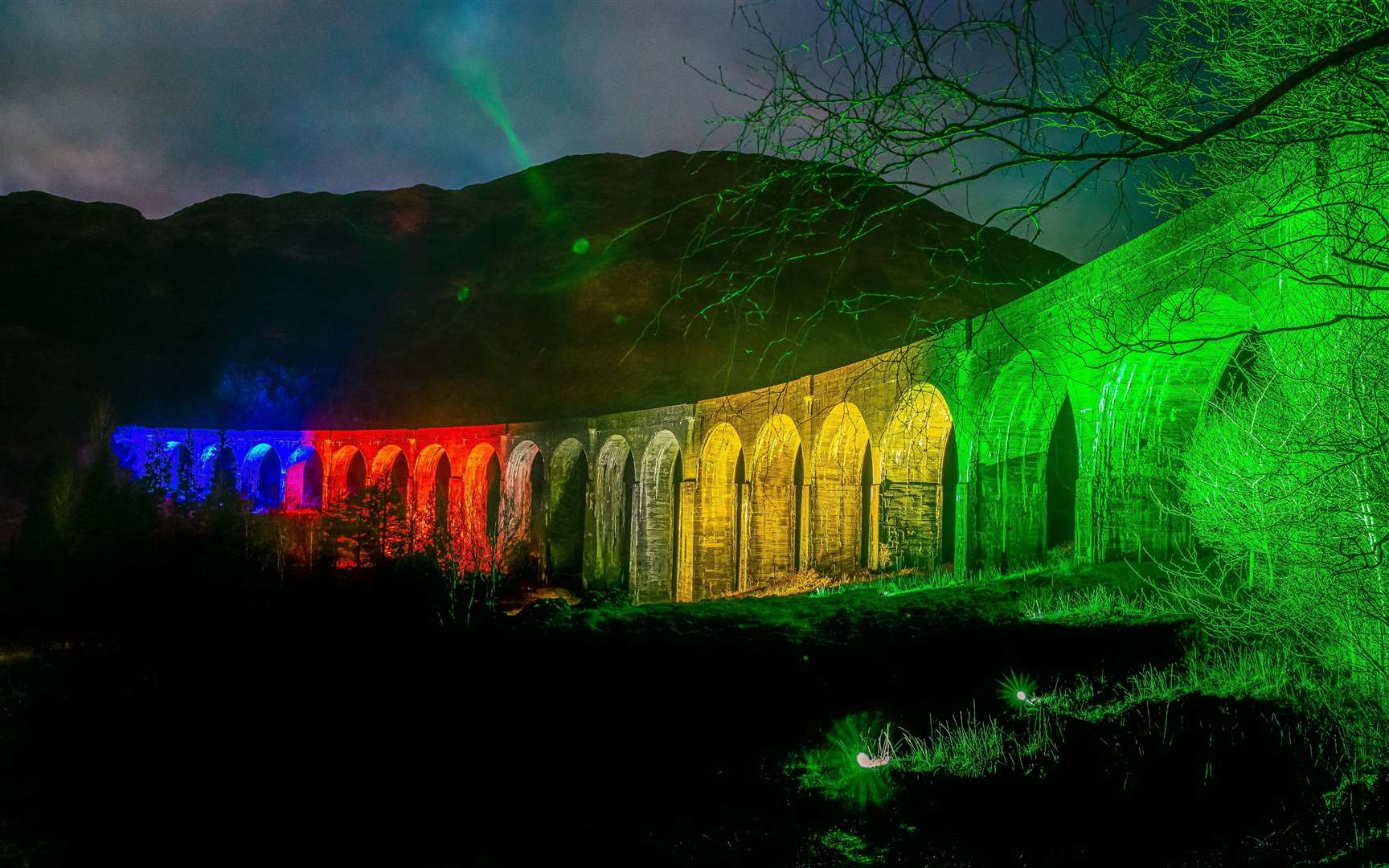 Glenfinnan Viaduct lit up.