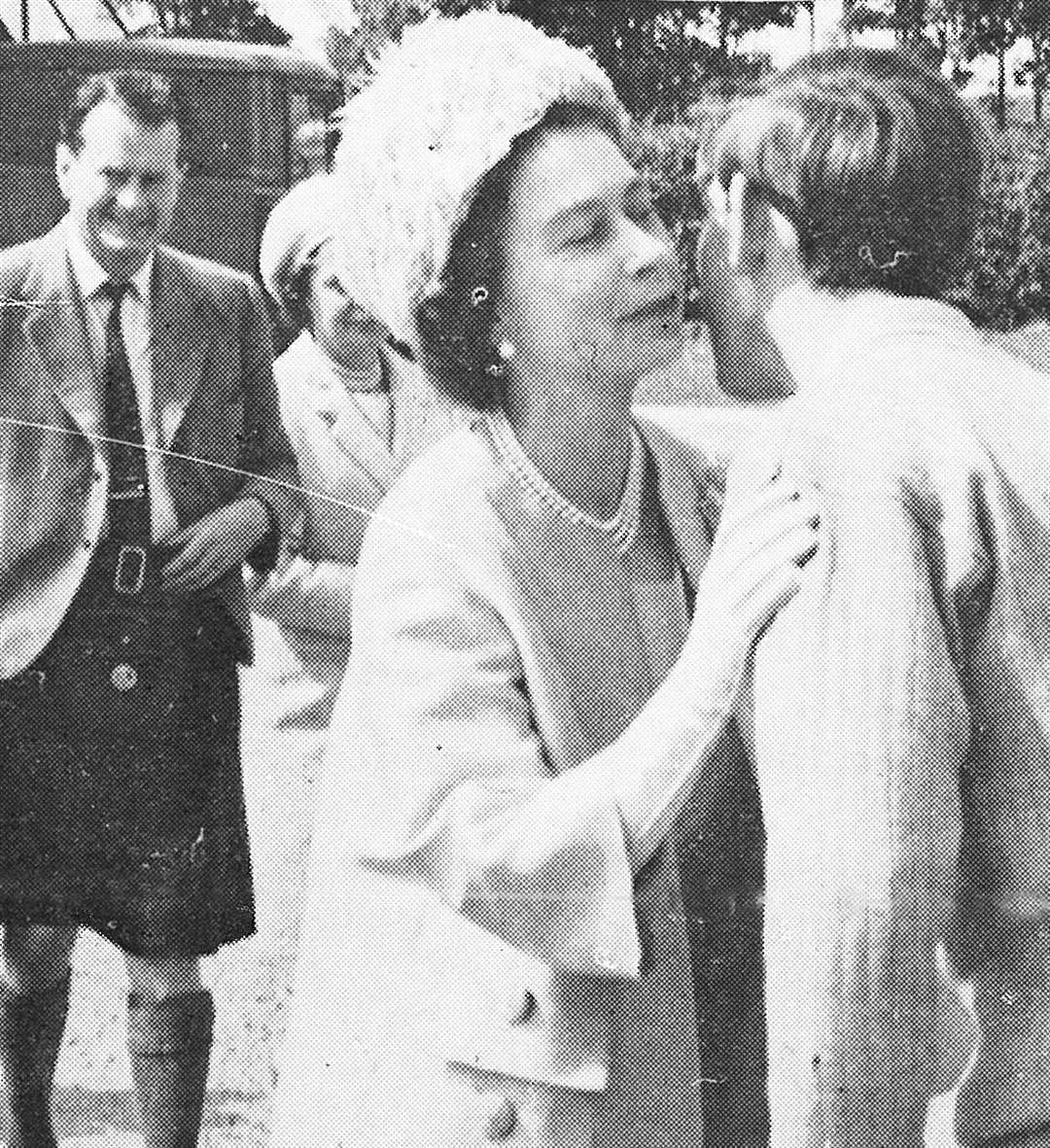 Greeting Prince Charles at Gordonstoun in July 1967. Pictured behind are Captain Iain Tennant and his wife Margaret.