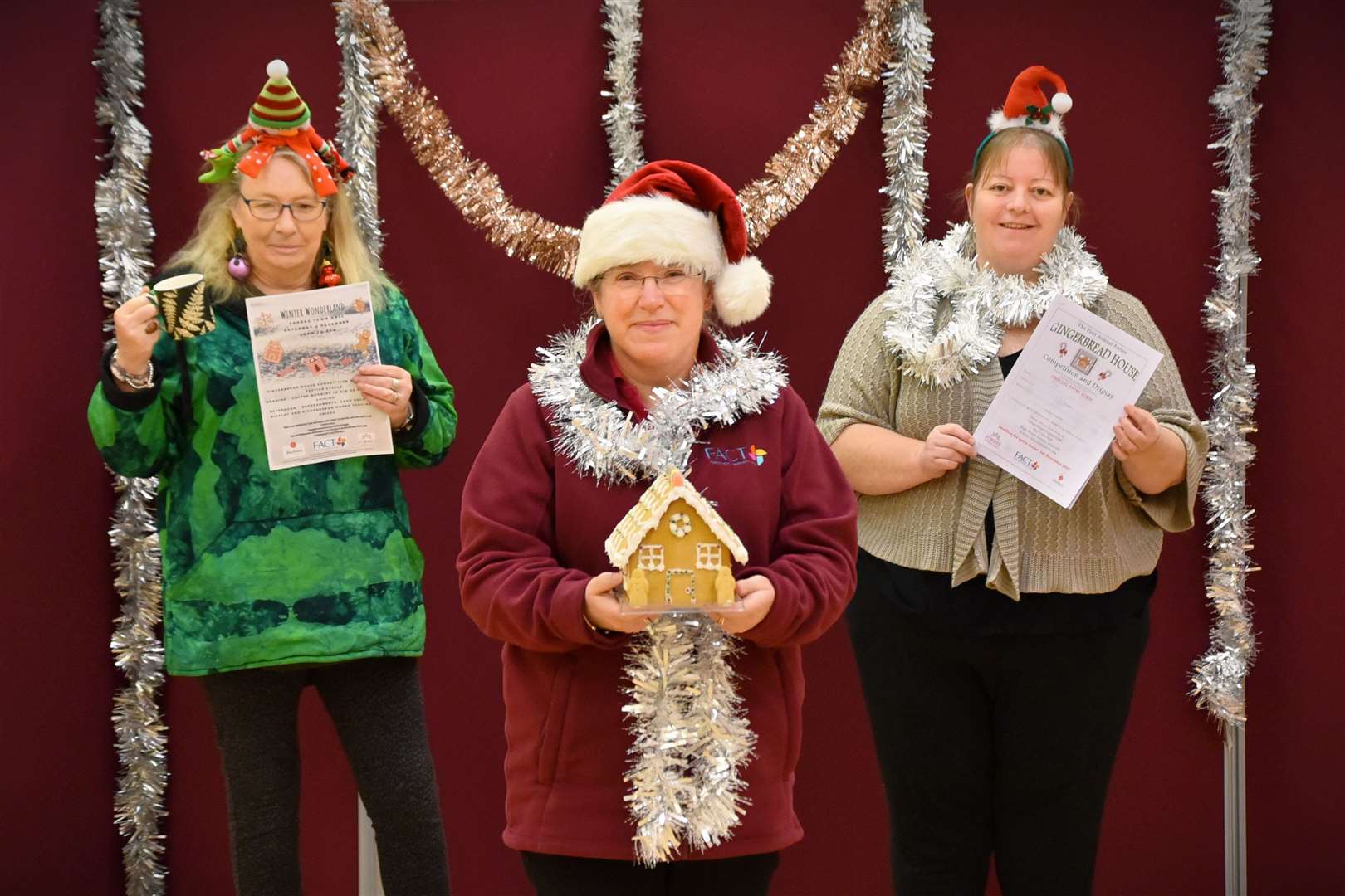 FACT volunteer Liz Stewart, project officer Lorretta Oliphant and volunteer Rachel Philp are looking forward to the festive event.