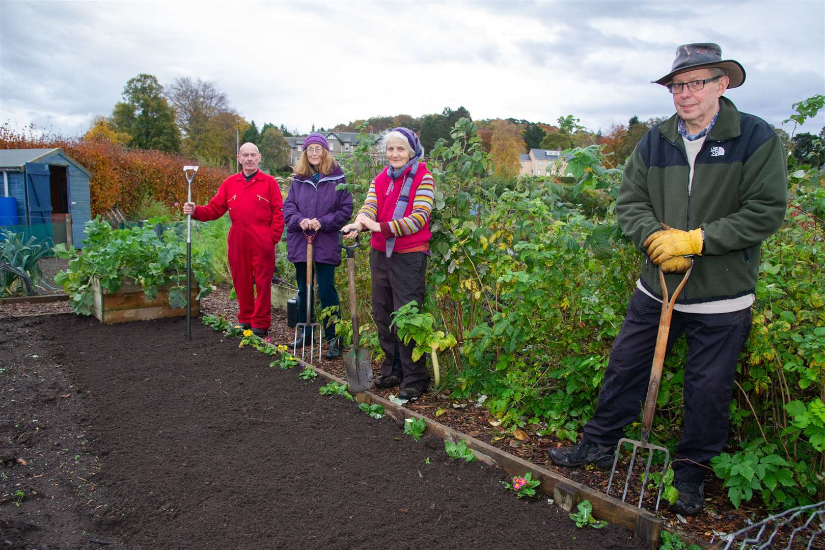 Steve Ferris (right) is joined by Billy Hardie, Joanna Legard and Daphne Francis at the Forres Community Gardens. Picture: Daniel Forsyth.