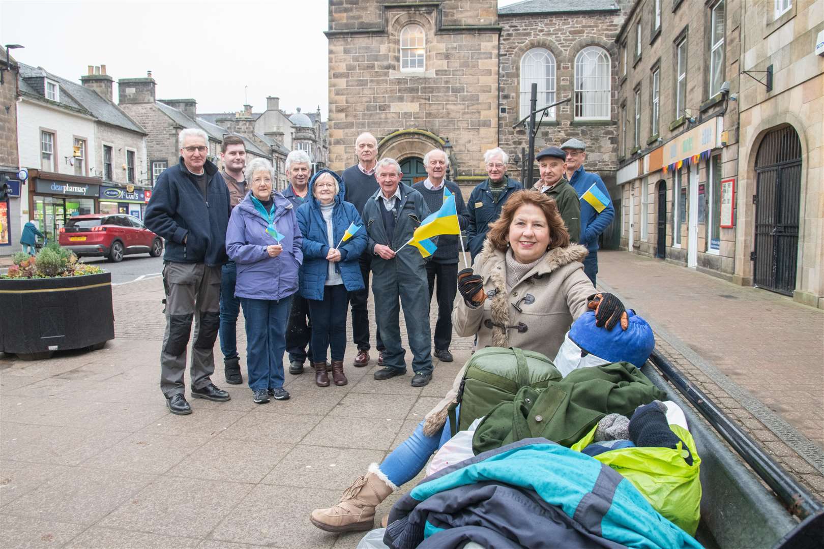 Yvonne Findlay is joined by Forres Heritage Trust volunteers at the Tolbooth. Picture: Daniel Forsyth