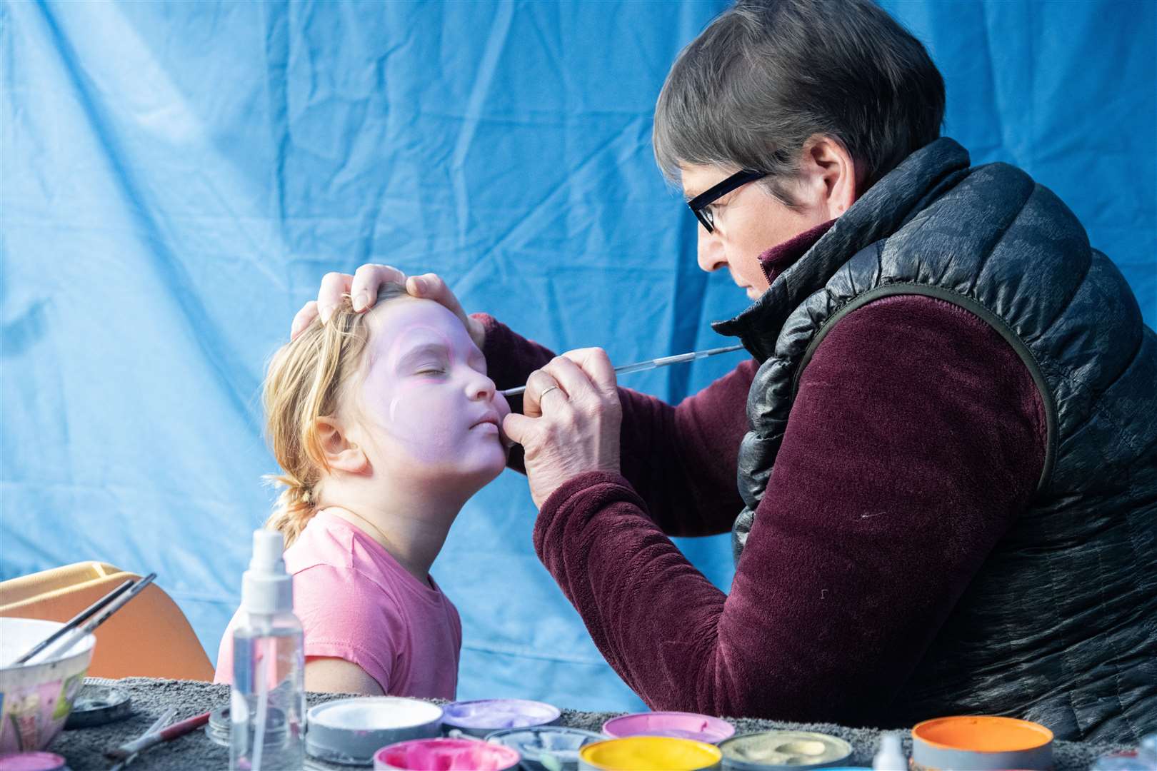 Mikayla McRobbie choosing a purple bunny from Bubbles and Co's face painting stall. Picture: Beth Taylor