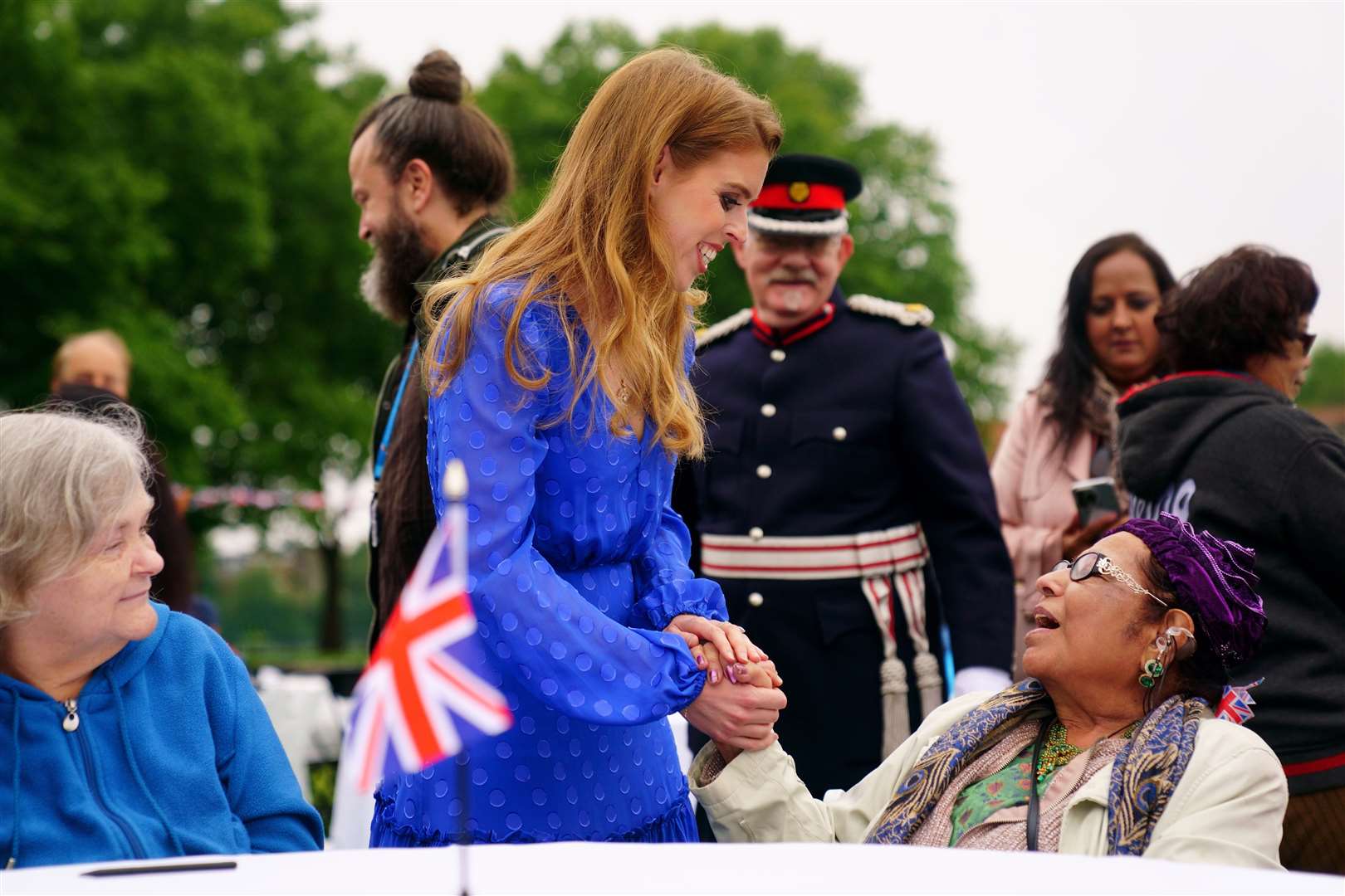 Princess Beatrice talks with a member of the public during the Big Jubilee Lunch (Victoria Jones/PA)