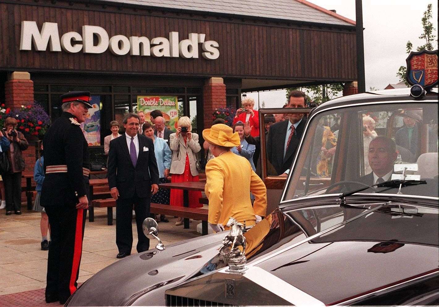 The Queen arrives at a McDonald’s restaurant in Cheshire in 1998 (PA)