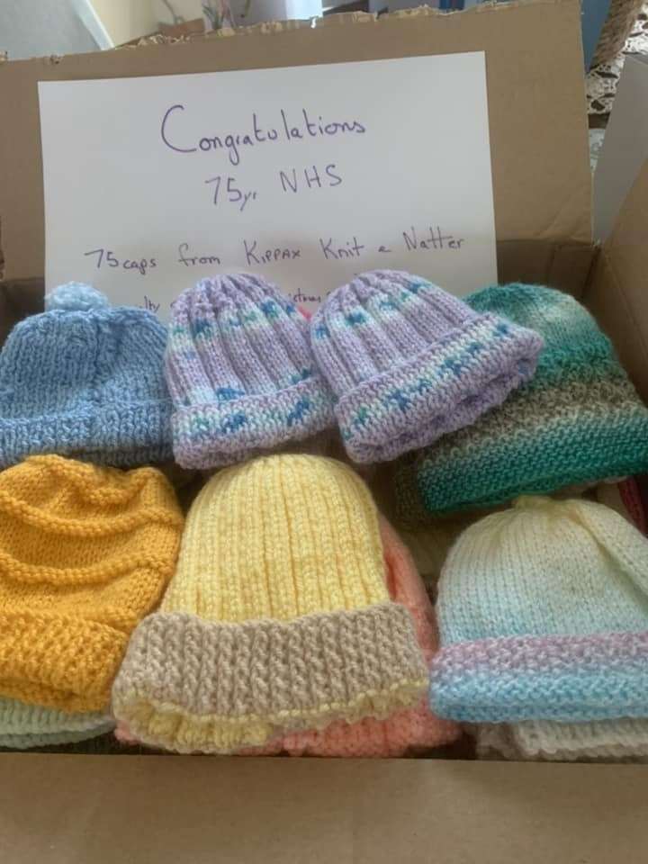 The 75 baby hats knitted by the Knit and Natter group for the NHS in Leeds (Kathleen Jackson/PA)