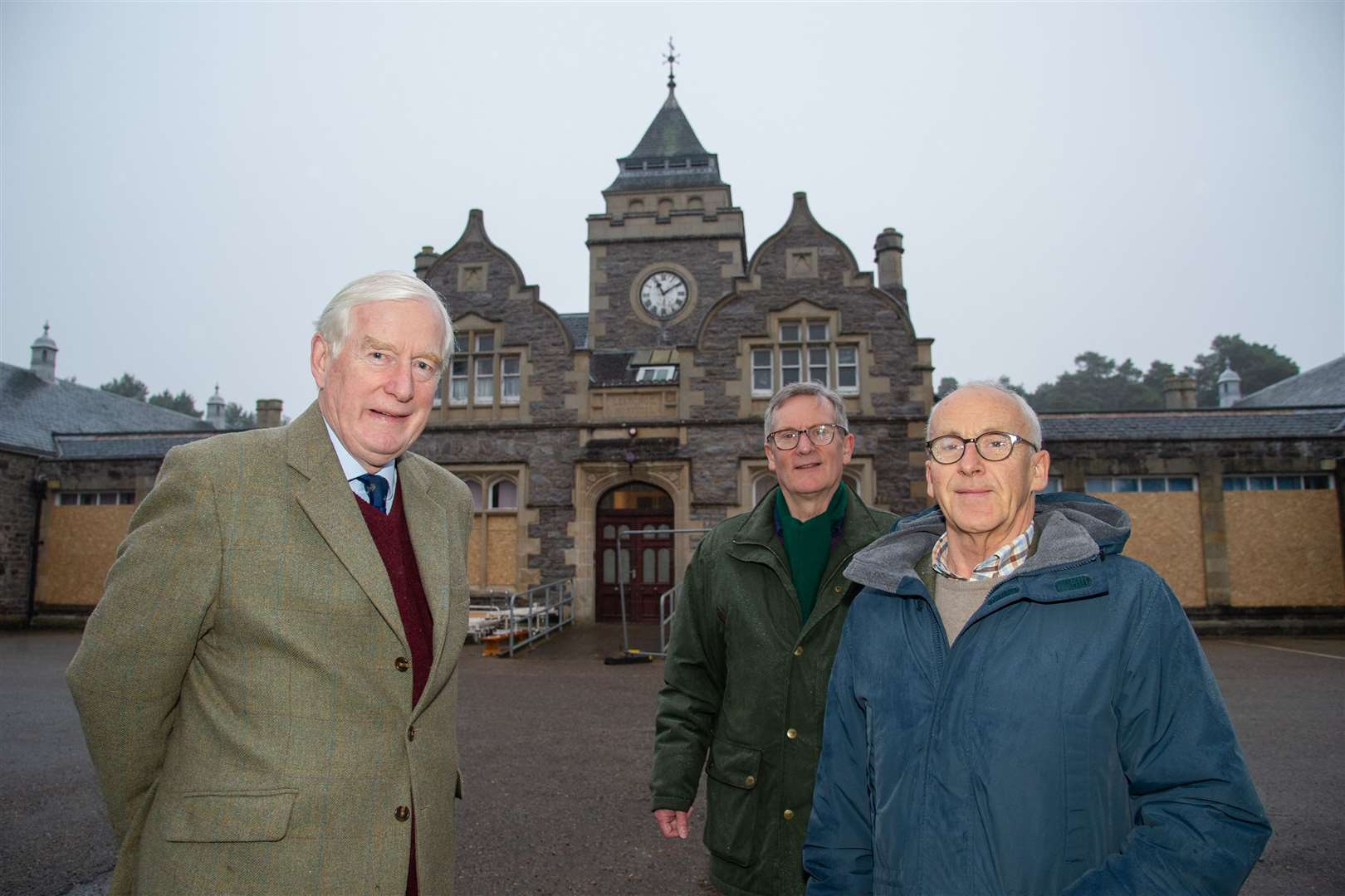Leanchoil steering group members Major General Seymour Monro (left), Tom Duff and Andrew Anderson outside the boarded-up hospital.