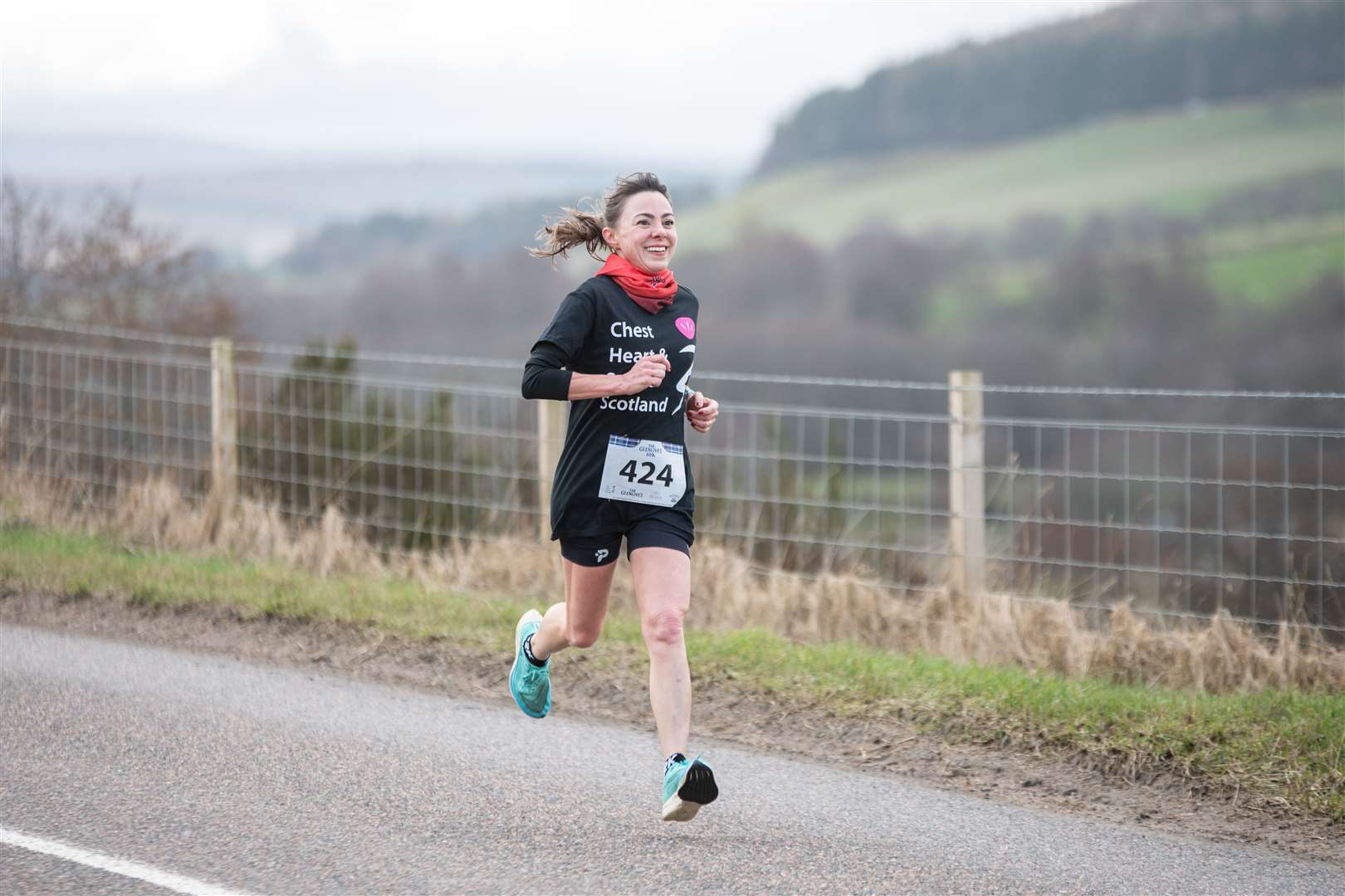 Sandra Soares is all smiles as she finishes the race in a time of 51:40...2023 Glenlivet 10k Race, which raises money for Chest Heart & Stroke Scotland. .. Picture: Daniel Forsyth..