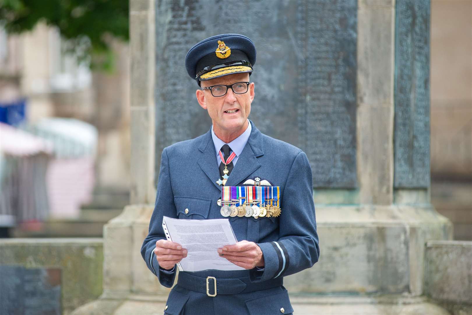 Air Commodore Alistair Monkman makes an address during the VJ Day service at Elgin's Plainstones on Saturday. Picture: Daniel Forsyth.
