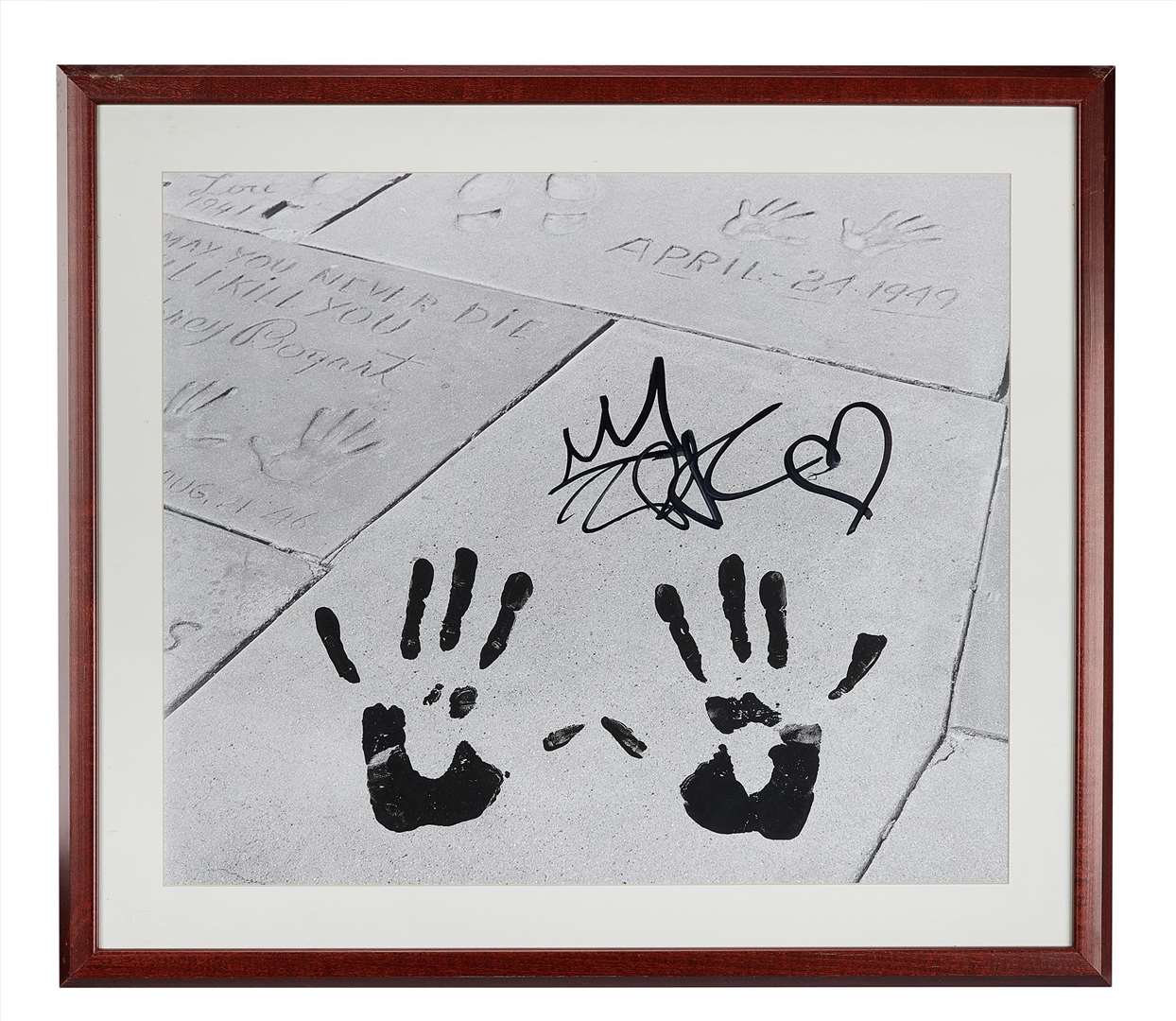 Other items to be auctioned include a framed large-format black and white photo print with rap legend Shakur’s hand print (Julien’s Auctions/PA)