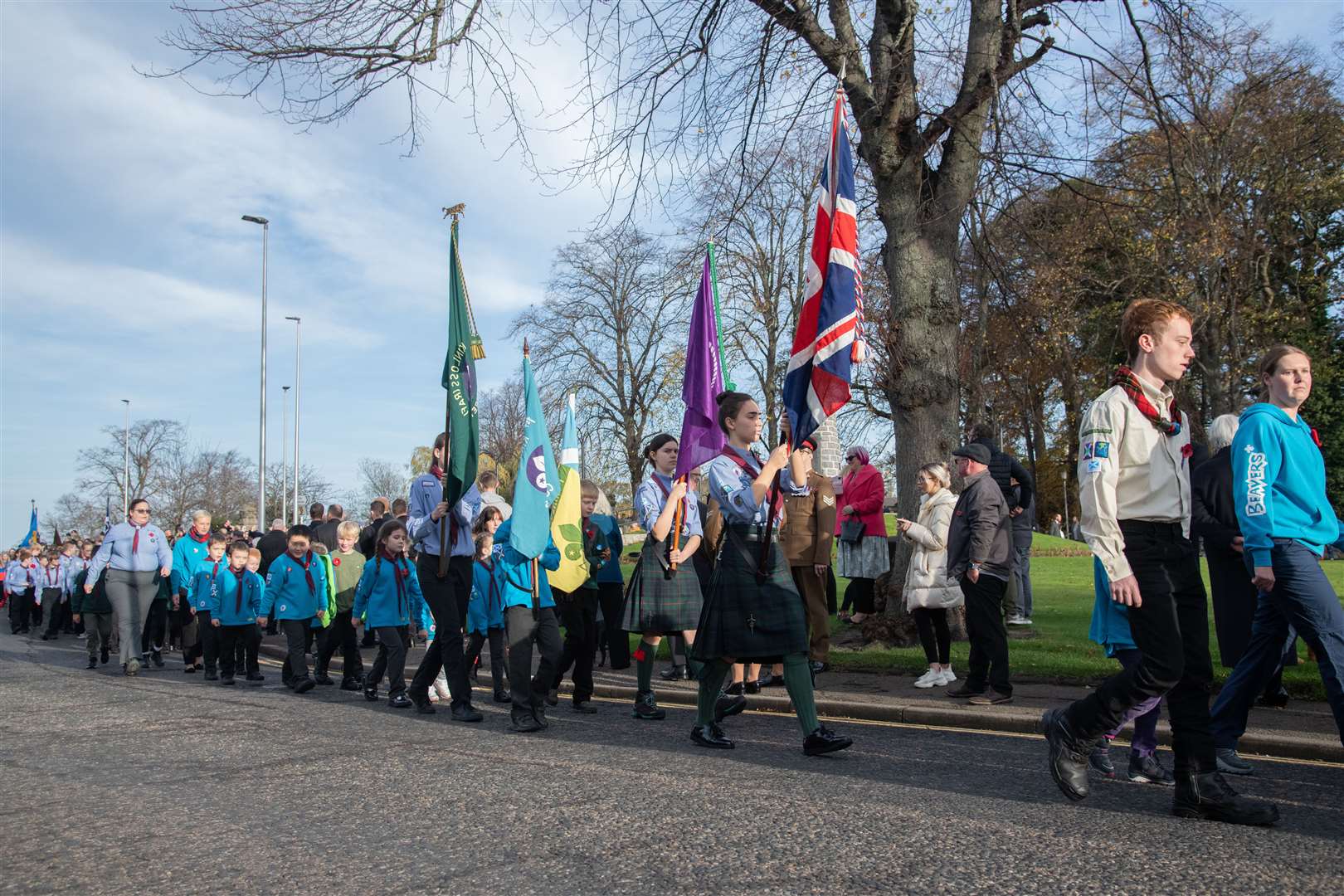 Representatives of local children's and youth groups on their way to the wreath laying. Picture: Daniel Forsyth