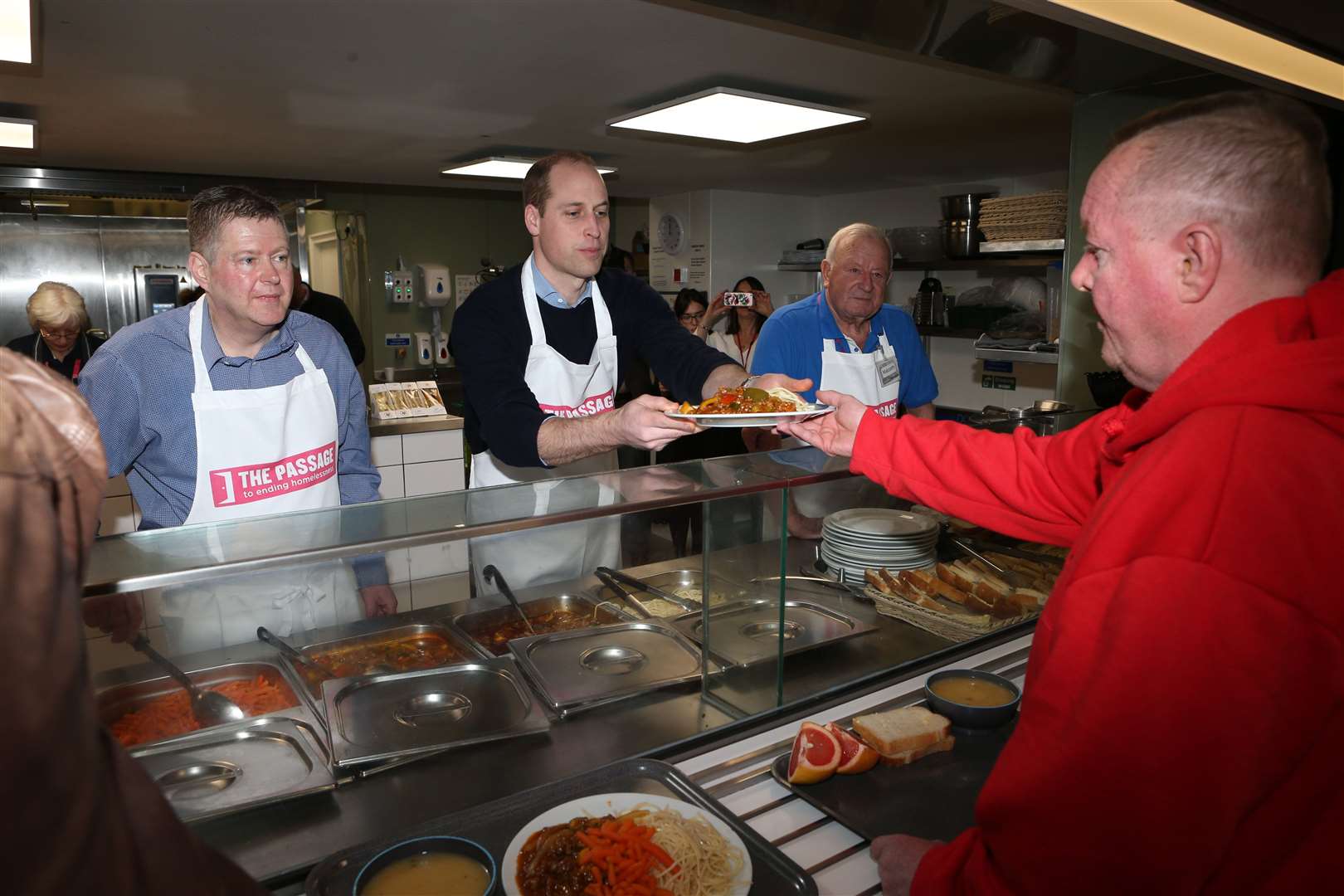 William served lunch during a visit to homelessness charity The Passage in 2019 (Ian Vogler/Daily Mirror/PA)