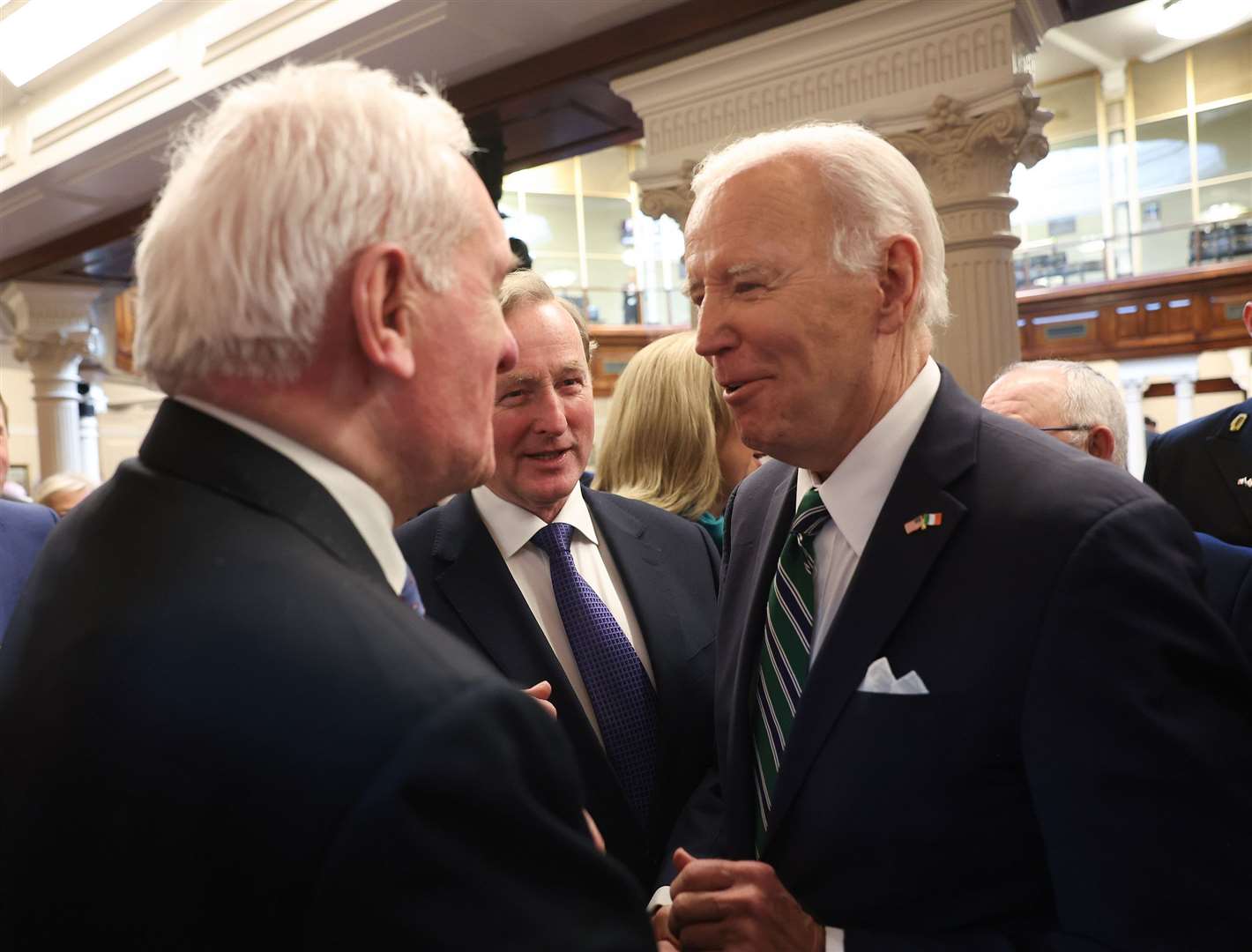 Joe Biden with former Irish premiers Bertie Ahern and Enda Kenny (Tony Maxwell/PA)