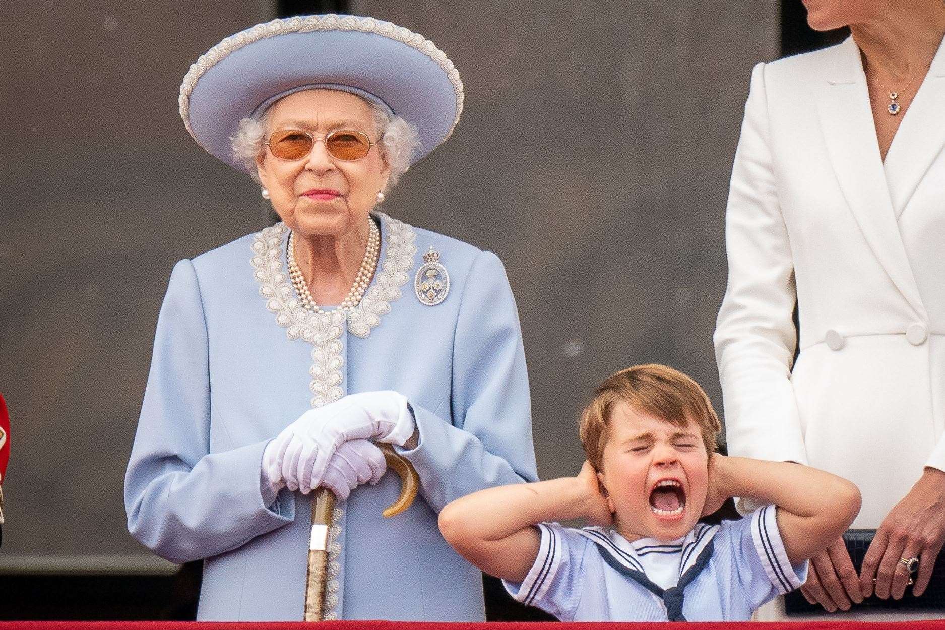 The Queen with Prince Louis on the balcony of Buckingham Palace (Aaron Chown/PA)
