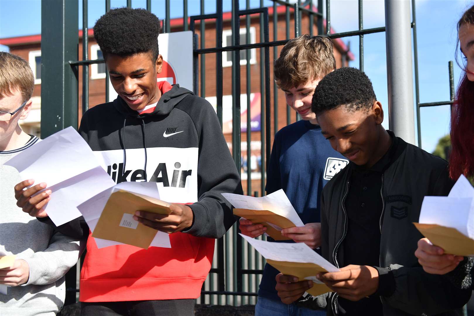 Pupils open their results at Bristnall Hall Academy in Oldbury (Jacob King/PA)