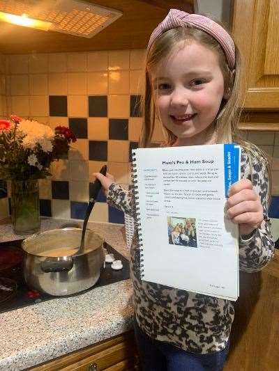 Chloe Nicolson (6) cooking her great grandma's recipe for soup.