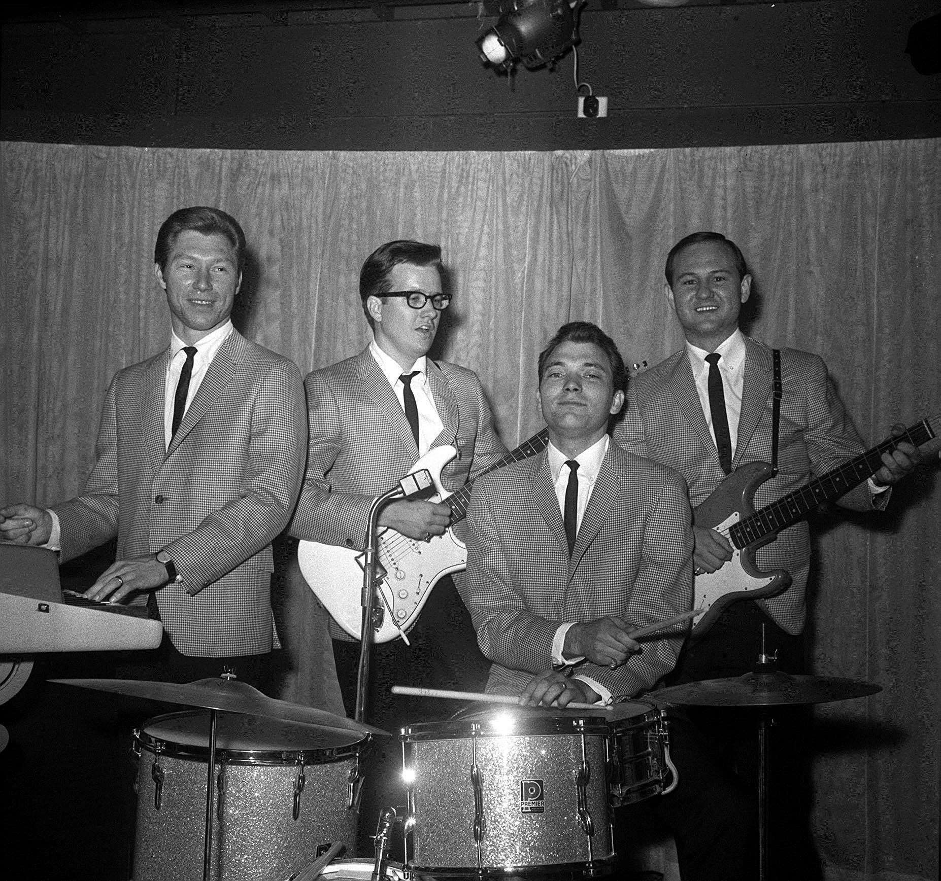 The drummer (centre-right) is credited with co-writing hits including That’ll Be the Day and Peggy Sue (PA)