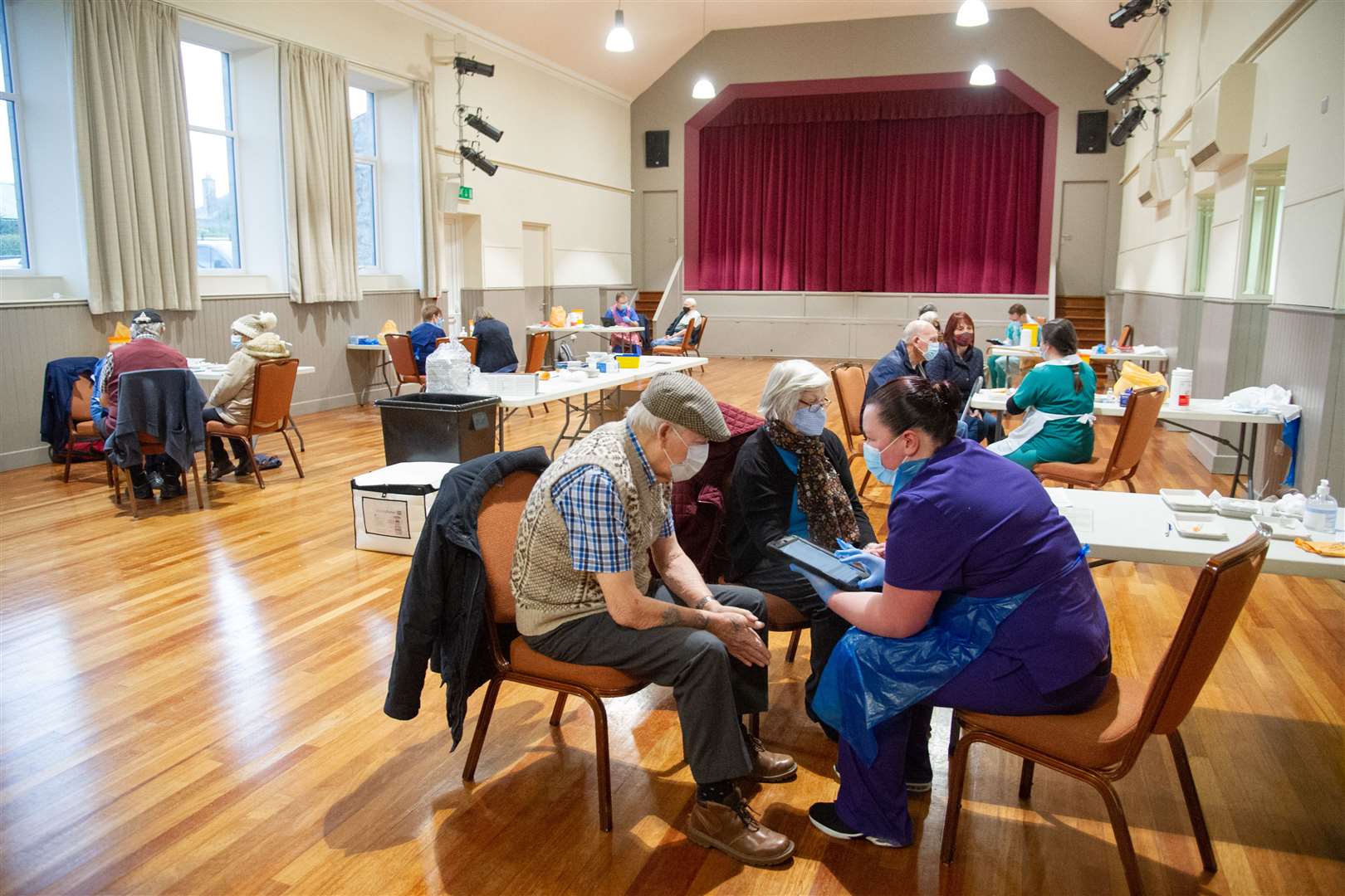 Over-80s attend Fochabers Public Institute for their Covid-19 vaccinations on Wednesday. Picture: Daniel Forsyth.