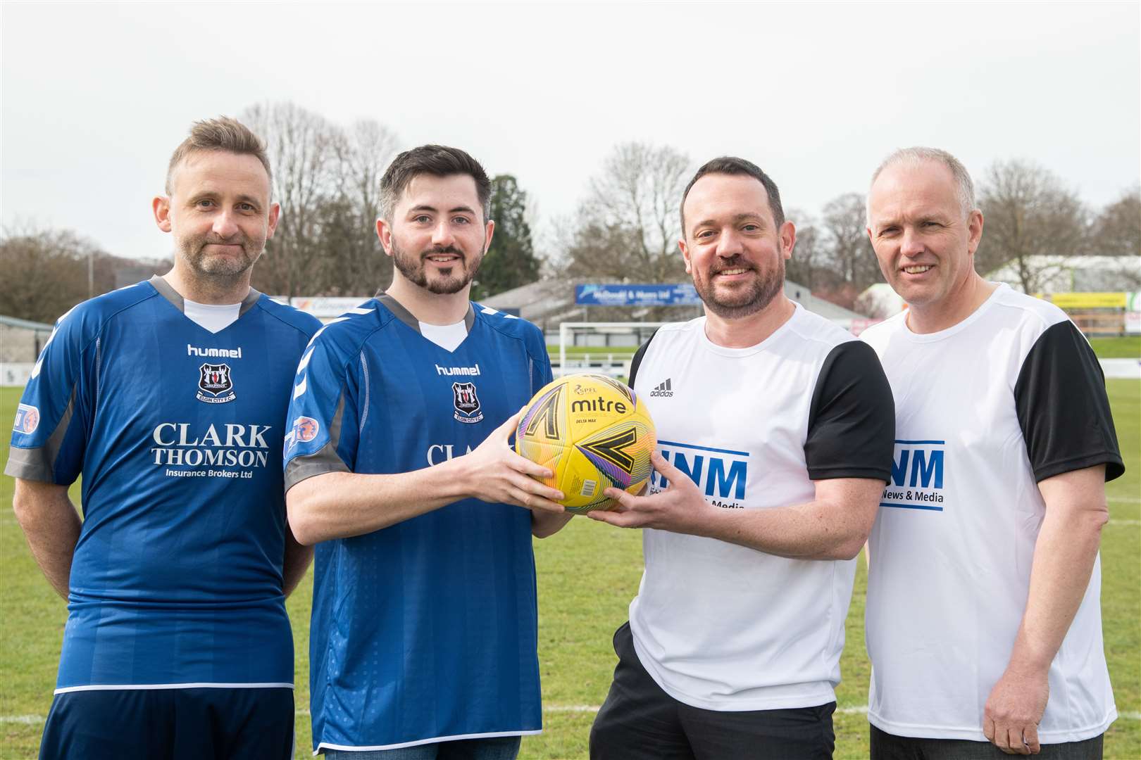 Throwing down the gauntlet, all in the name of charity. Steve Borzoni (left) and Harry Bruce from Moray Police, with Joe Millican and Chris Saunderson of Highland News and Media. Picture: Daniel Forsyth