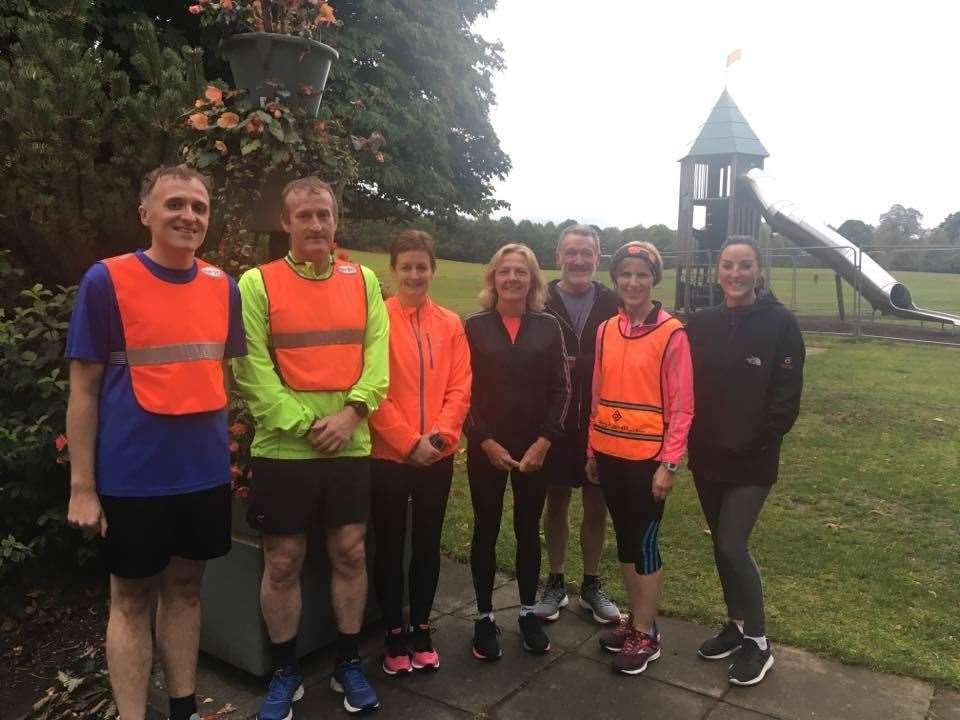 Forres Jog Scotland coaches Ewen Watson (left) and David Mcculloch (second left) with volunteers.