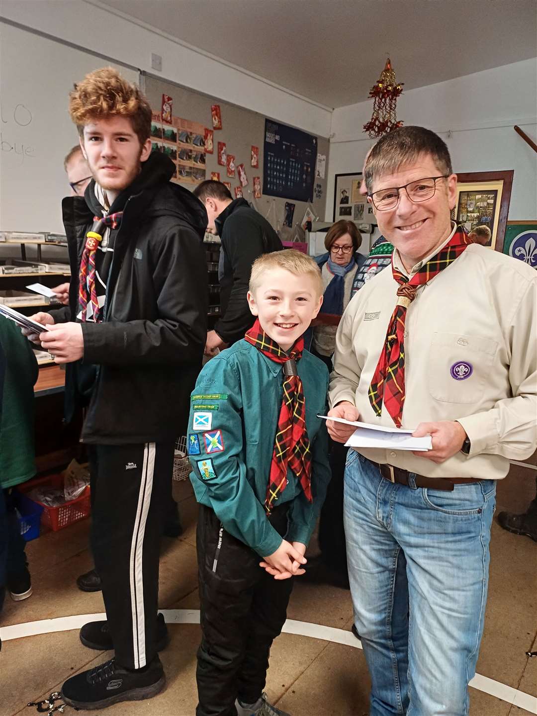 Young Leader Nyah Davidson, Scout Callum Simpson and Scout Leader John Berry