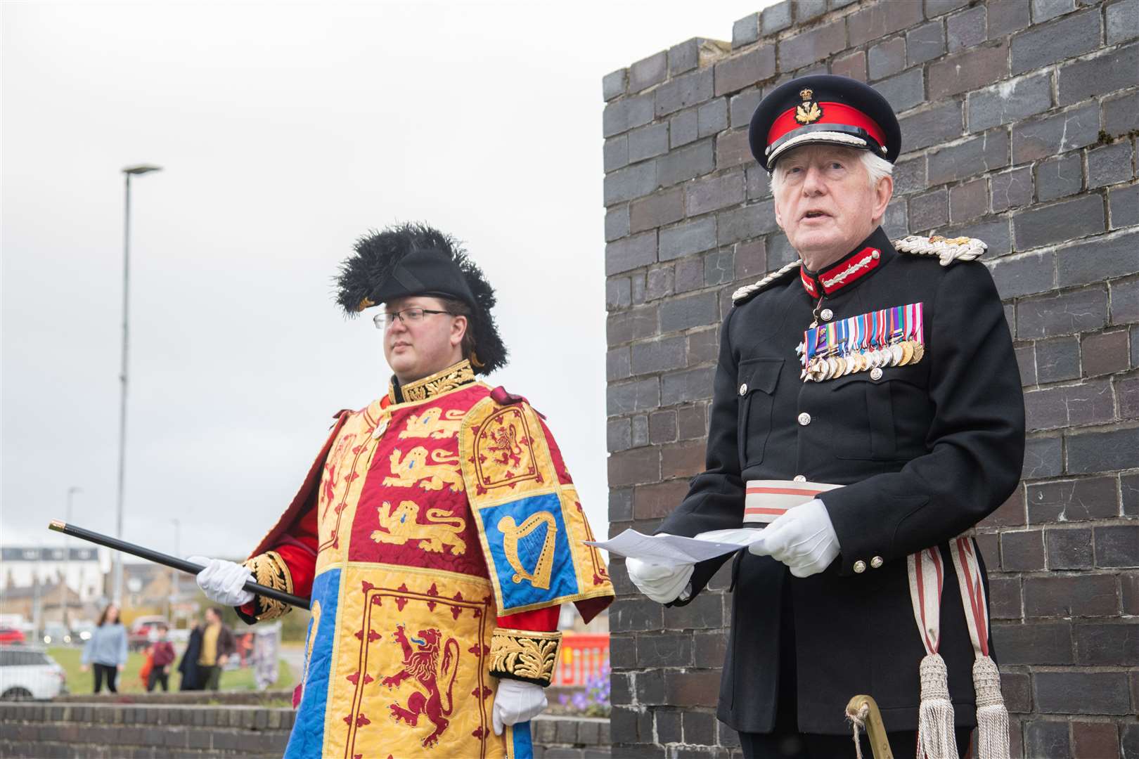 From left; Philip Tibbetts (Lyon Court Vexillologist for Scotland) and Lord Lieutenant of Moray Seymour Monro...The Moray flag is unveiled during a ceremony outside the Elgin Town Hall. ..Picture: Daniel Forsyth..