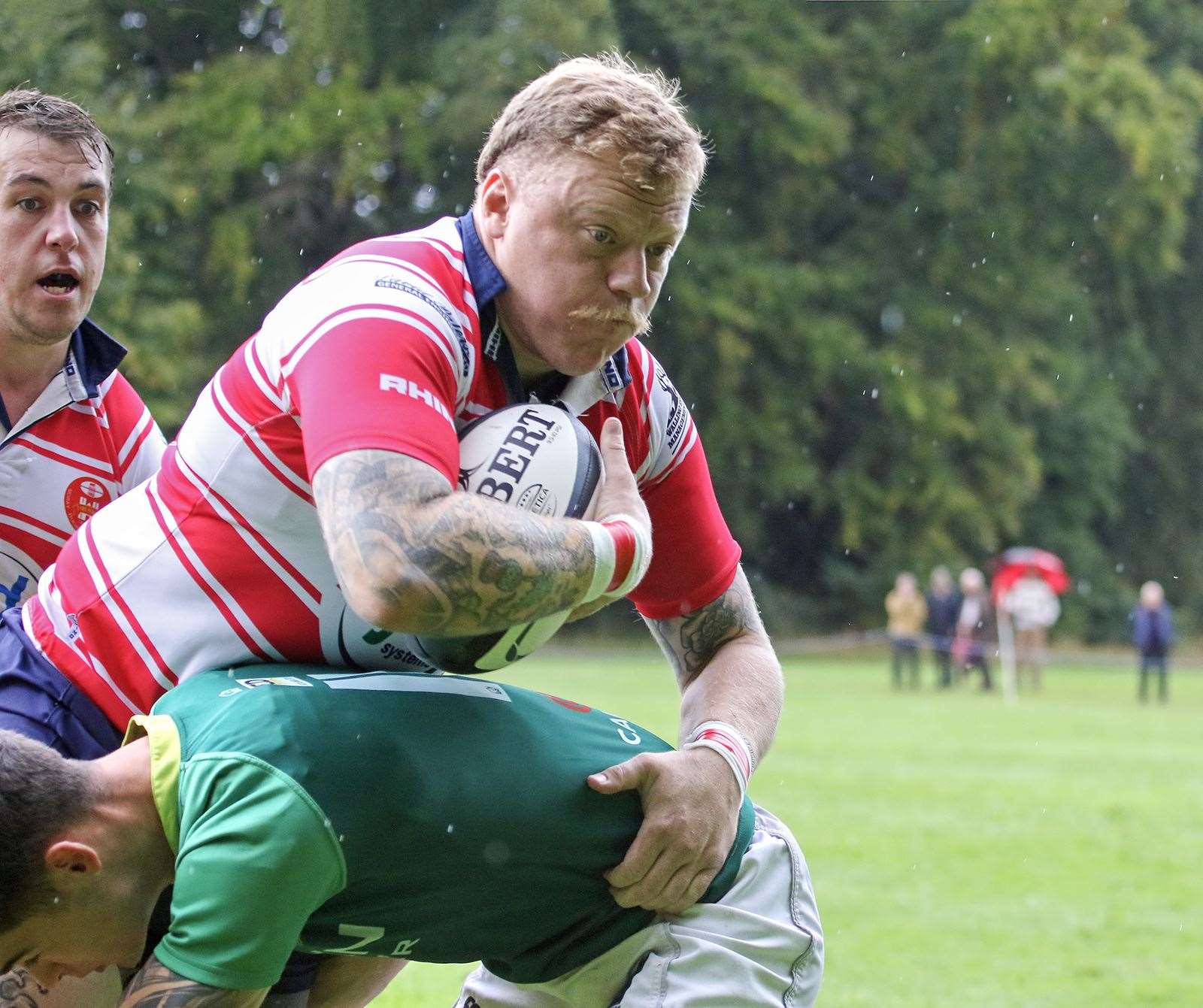 Lewis Scott being tackled, Cameron Hughes in background. Picture: John MacGregor