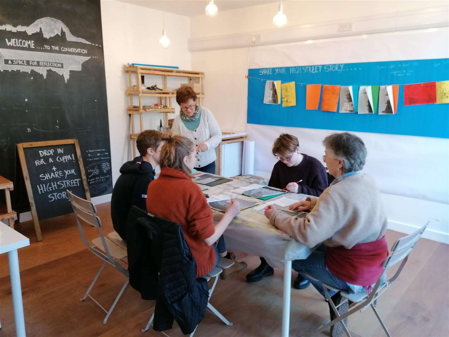 Moray Councillor Lorna Creswell (back) joining in on a printmaking session.