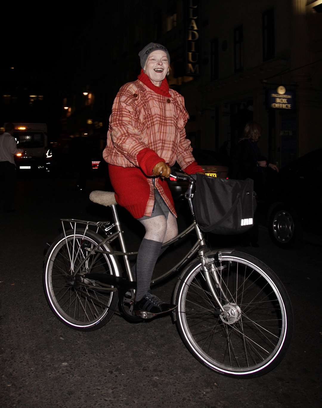 Dame Vivienne arrives for a book launch party, at Aqua in central London, on a bike (Yui Mok/PA)