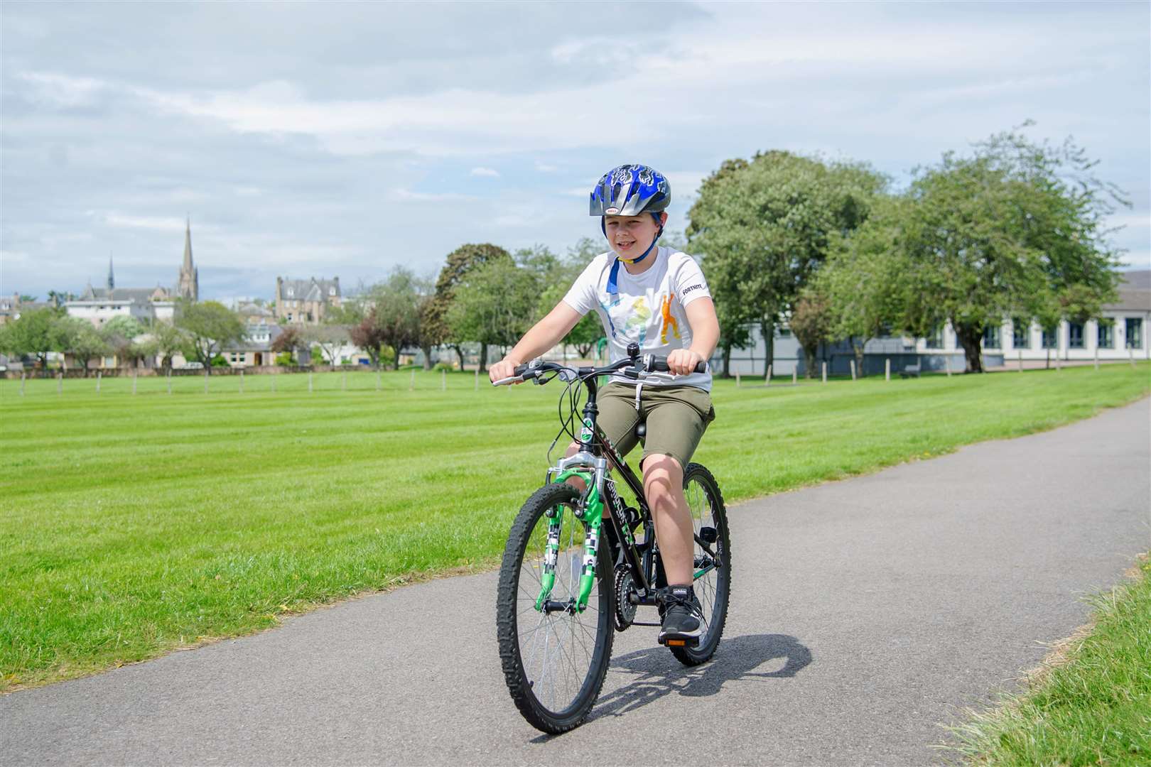 8-year-old Kristian Ross, from Forres, is cycling the distance from his home to Edinburgh Zoo as he raises money for the Highland Wildlife Park. Picture: Daniel Forsyth.
