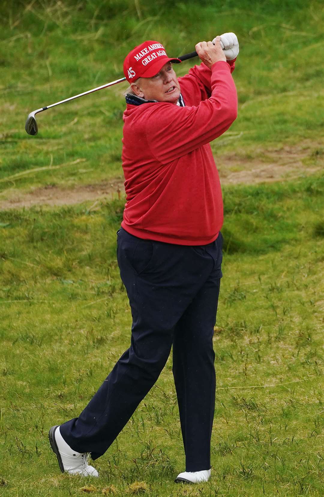 Former US president Donald Trump on the 15th hole in Doonbeg (Brian Lawless/PA)