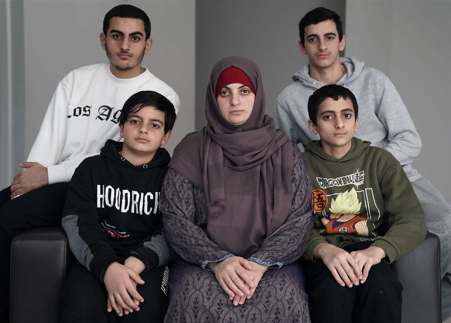 Zak Hania’s wife Batoul and the couple’s four sons had campaigned to get him out of Gaza (PA)
