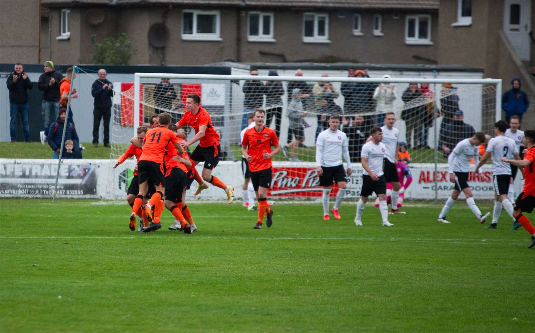 Rothes celebrate Ryan McRitchie's League Cup final winning goal against Brora Rangers at Lossiemouth in 2021. Picture: Becky Saunderson