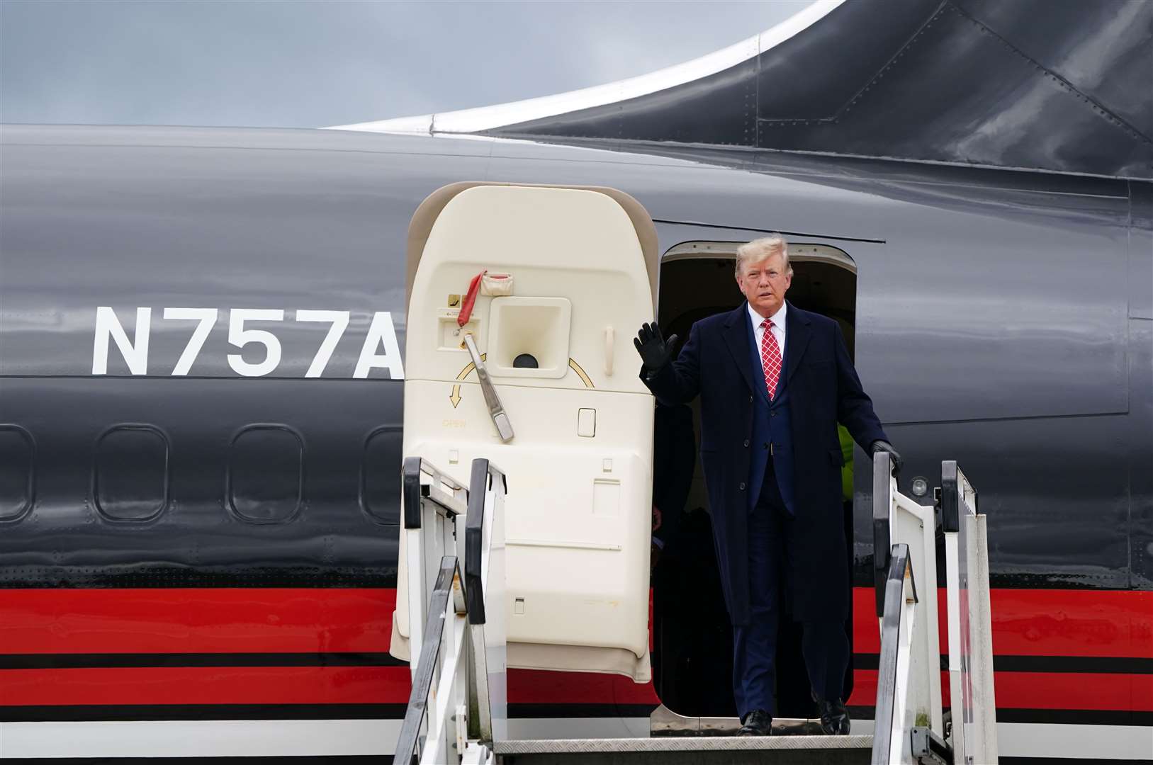 Former US president Donald Trump will visit his golf course near Aberdeen (Jane Barlow/PA)