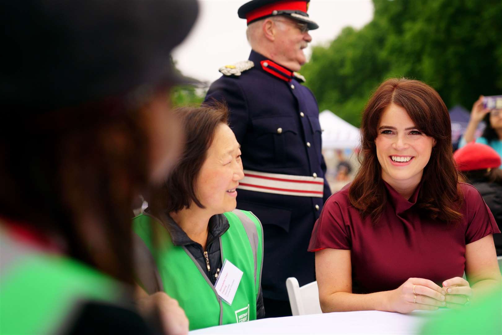 Princess Eugenie speaks to people at the lunch (Victoria Jones/PA)