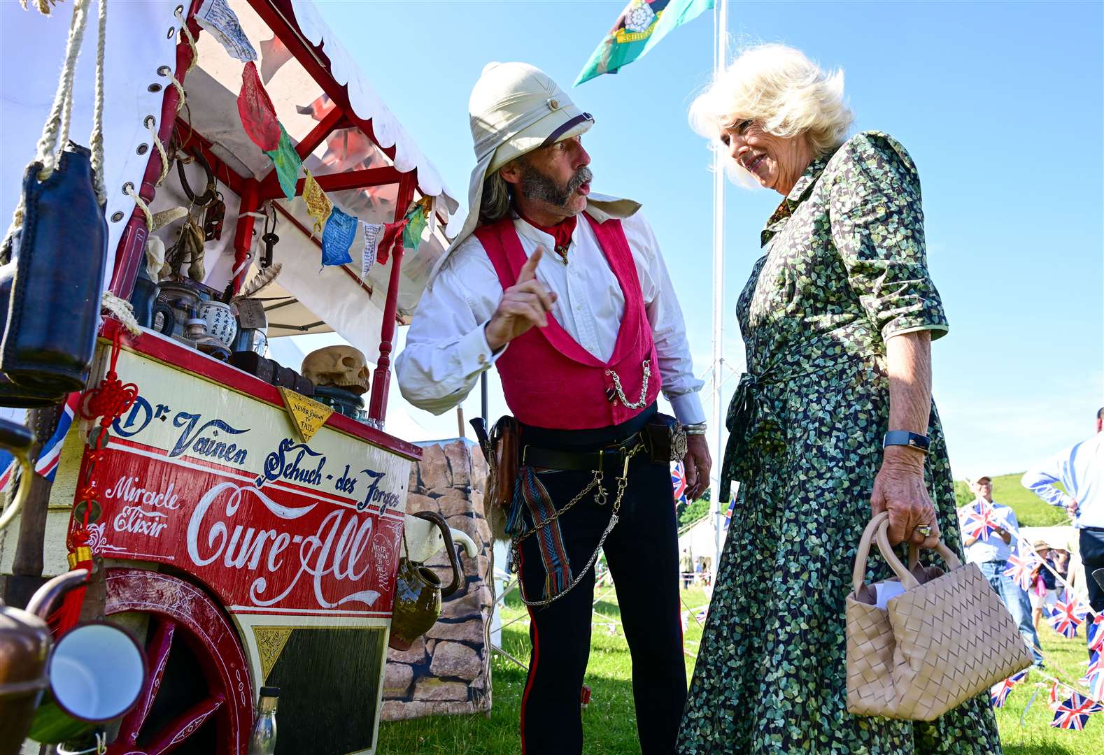 The Duchess of Cornwall meets a re-enactor during a tour of the festival (Finnbarr Webster/PA)
