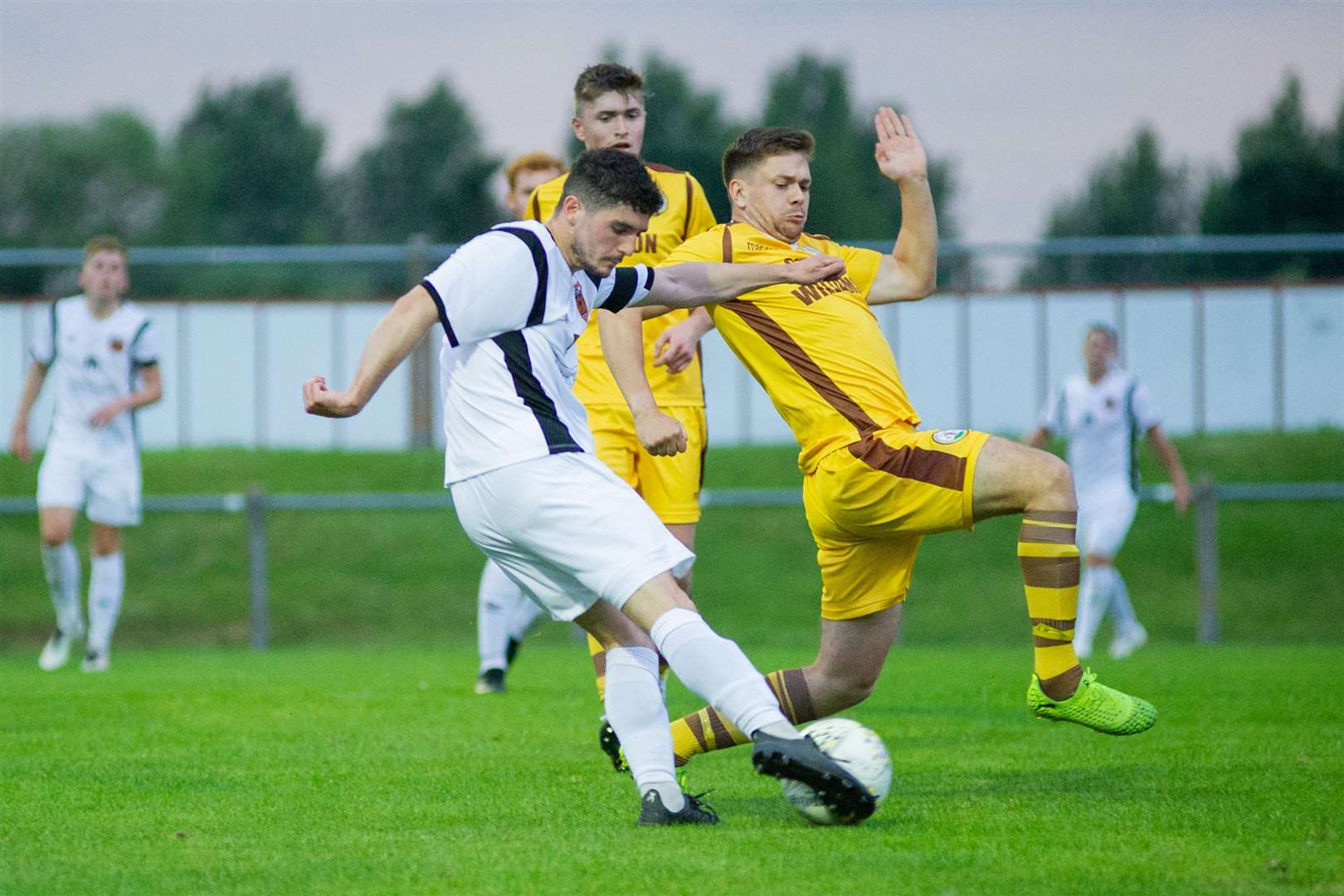 Rothes' Jack Brown fire home this Speysiders second goal of the evening...Forres Mechanics (0) vs Rothes FC (3) - North of Scotland Cup - Mosset Park, Forres 04/08/2021...Picture: Daniel Forsyth..