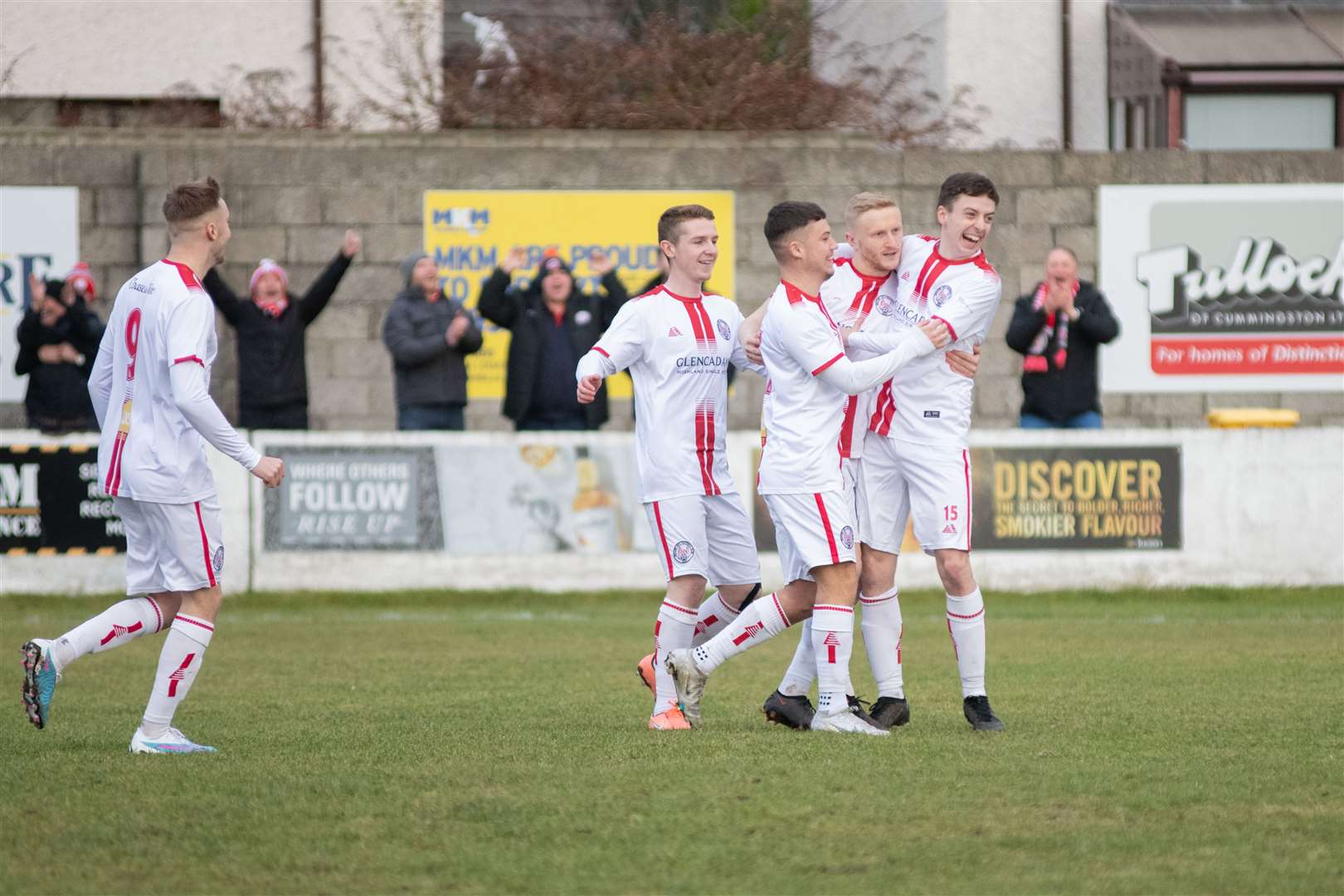 Marc Scott gets the congratulations after his quickfire Brechin City opener at Lossiemouth .Picture: Daniel Forsyth..