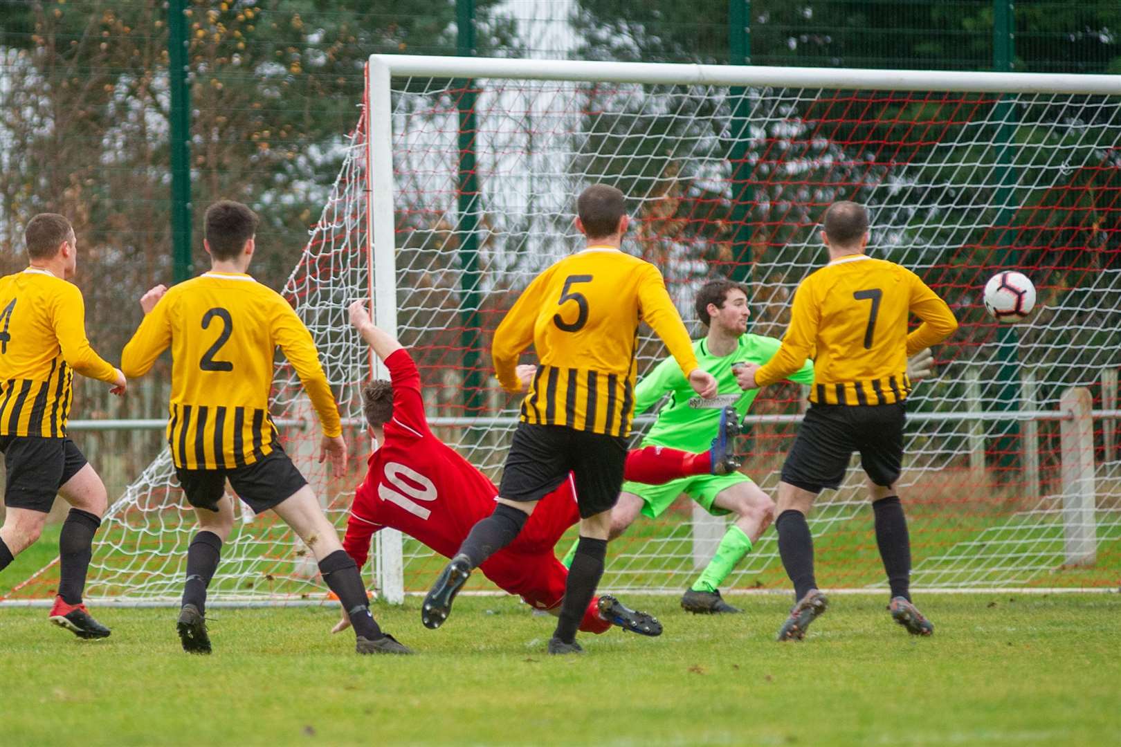 The Islavale defence and goalkeeper Elliot Gordon were unable to keep out Forres Thistle's opener scored by Neil Moir. Picture: Daniel Forsyth..