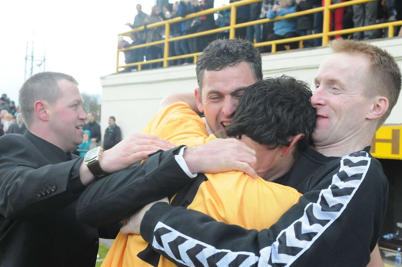 Charlie Rowley celebrates the 2012 Highland League title success with Graeme Grant, Charlie Brown (left) and Neil Whyte (right). Picture: Eric Cormack