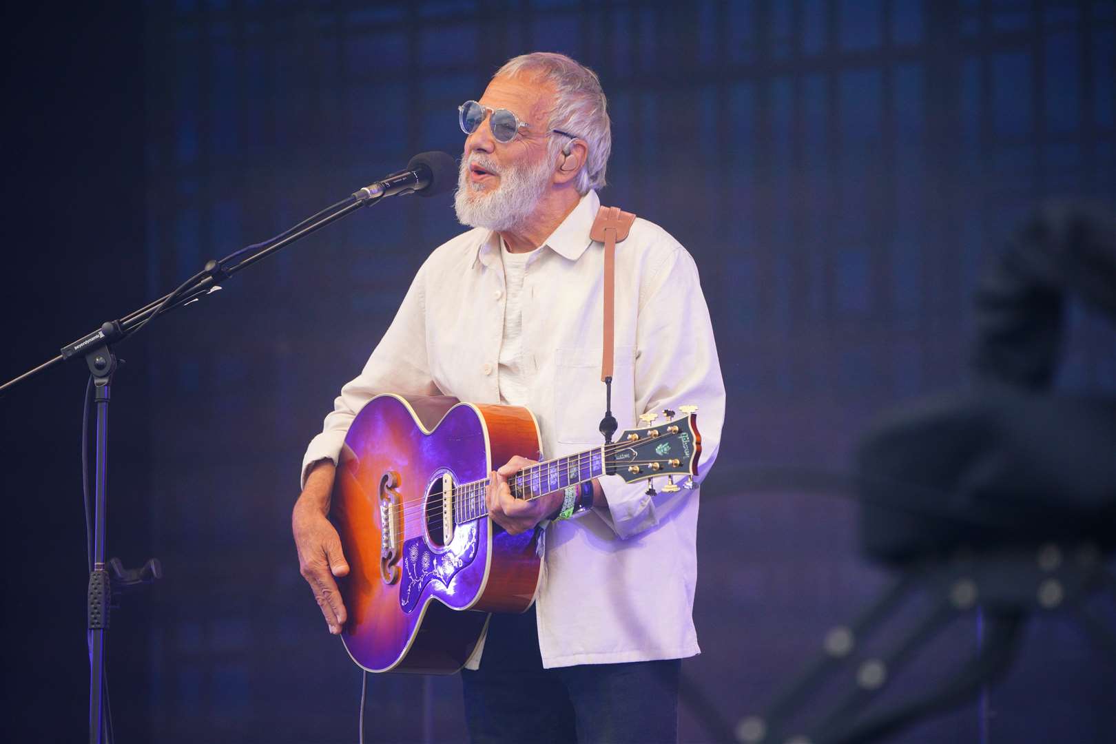 Yusuf / Cat Stevens performing on the Pyramid Stage in the tea-time legends slot (Ben Birchall/PA)
