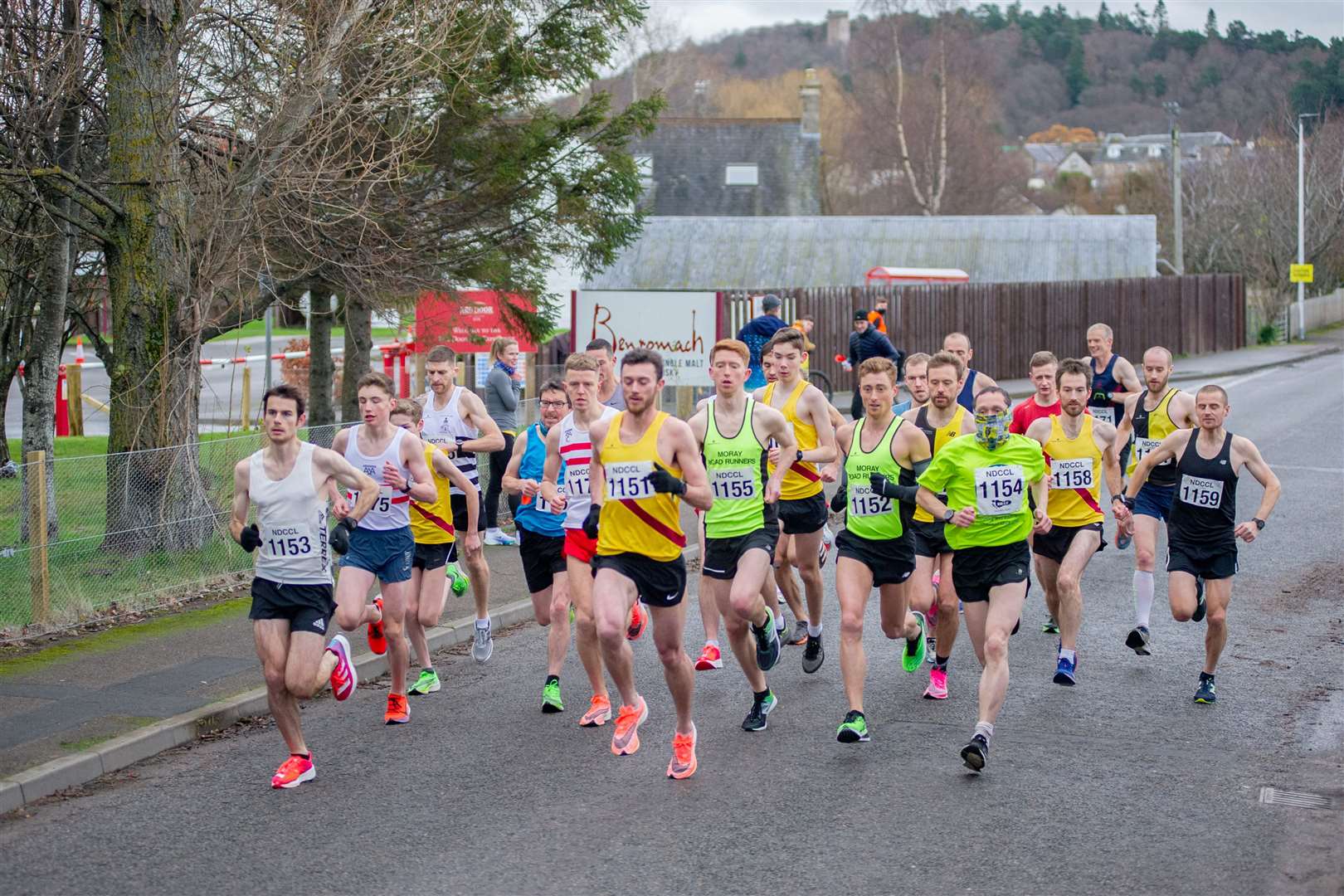 Sean Chalmers (1151) leads the first wave of runners at the Back to Basics 10k from Benromach distillery. Picture: Daniel Forsyth