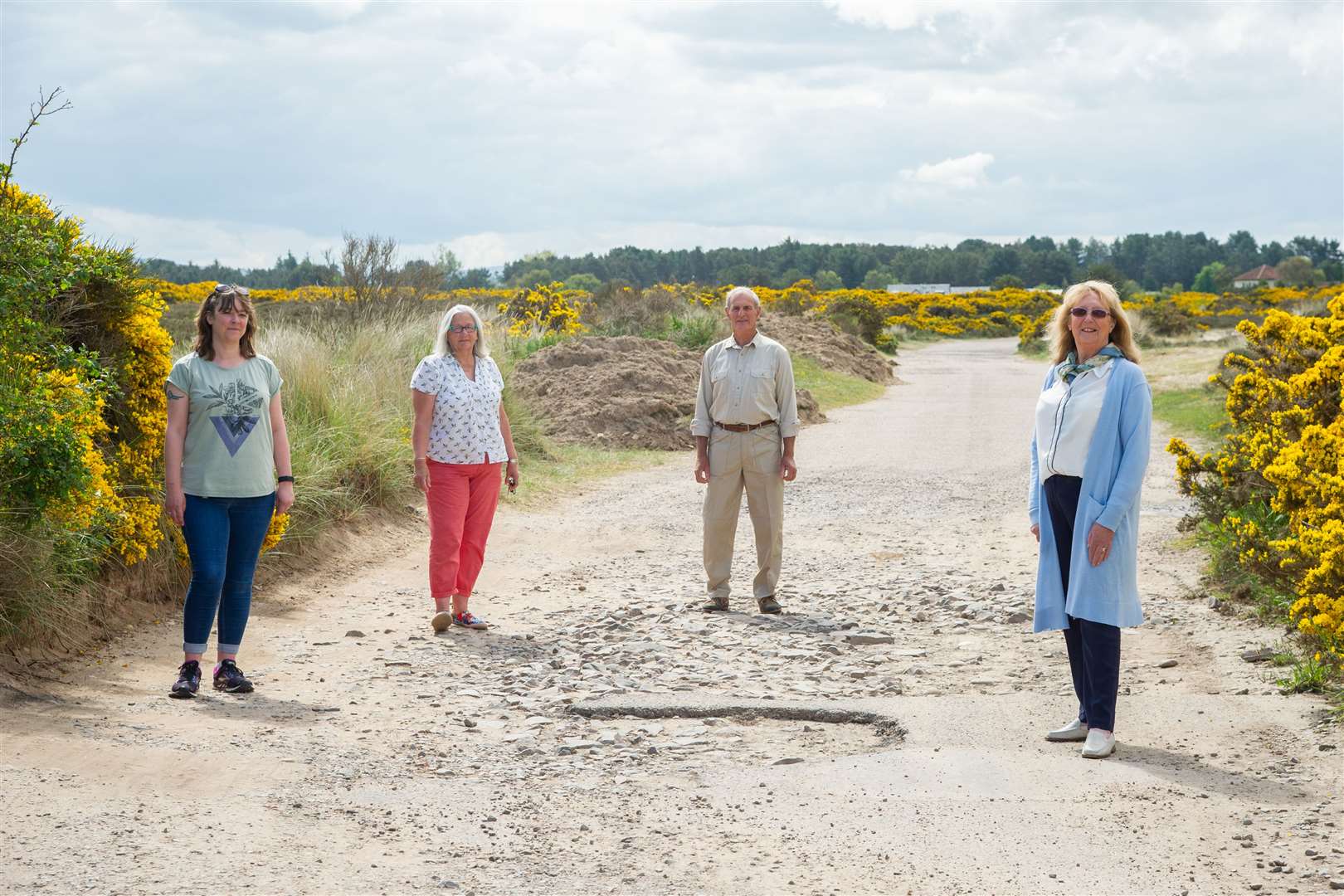 Sarah Theman, Cathy Low, Donald Watson and Christine Hunt of theFindhorn Village Conservation Company on the Dunes Road.