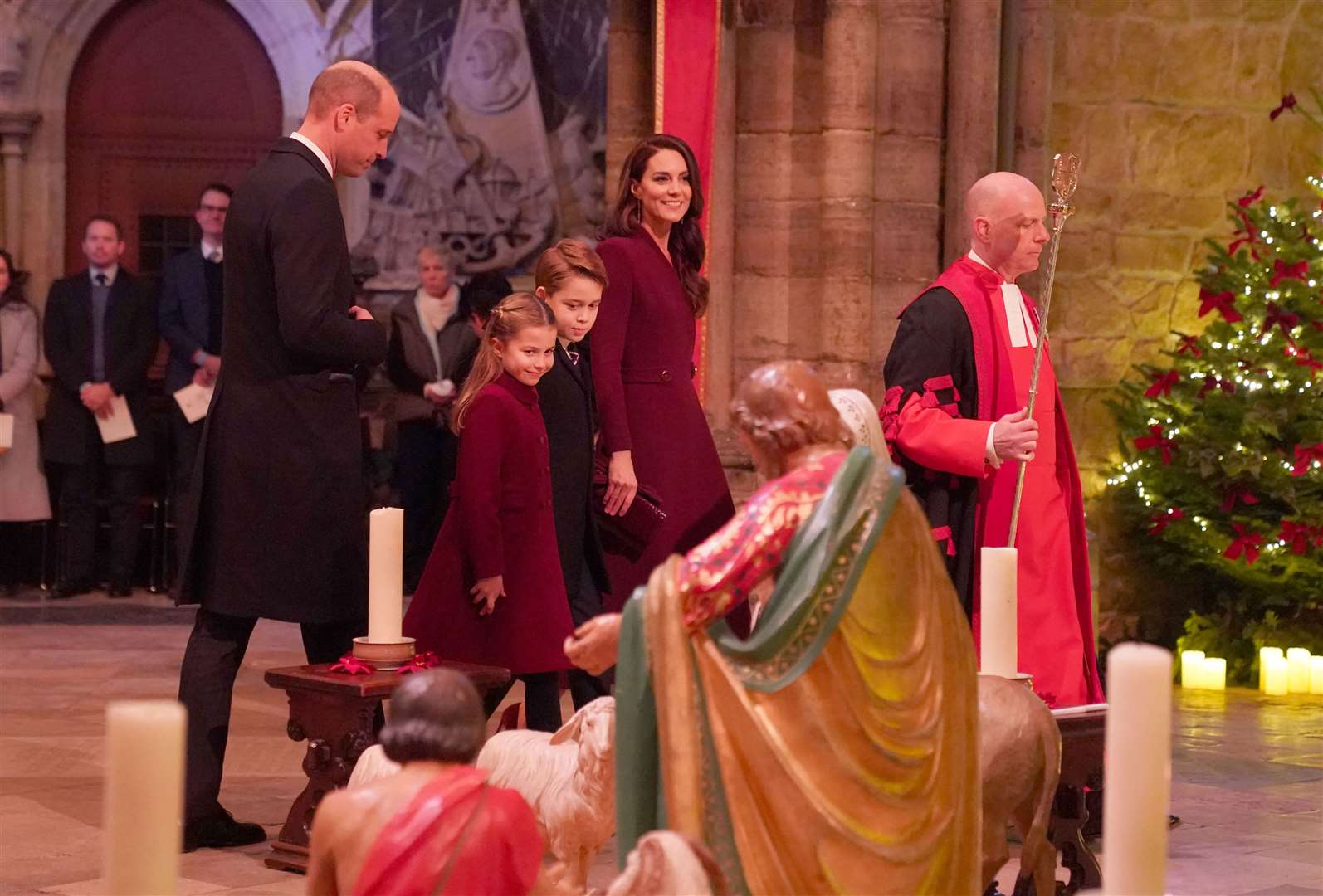 The Prince and Princess of Wales arriving with their children Princess Charlotte and Prince George for the carol service at Westminster Abbey (Kirsty O’Connor/PA)