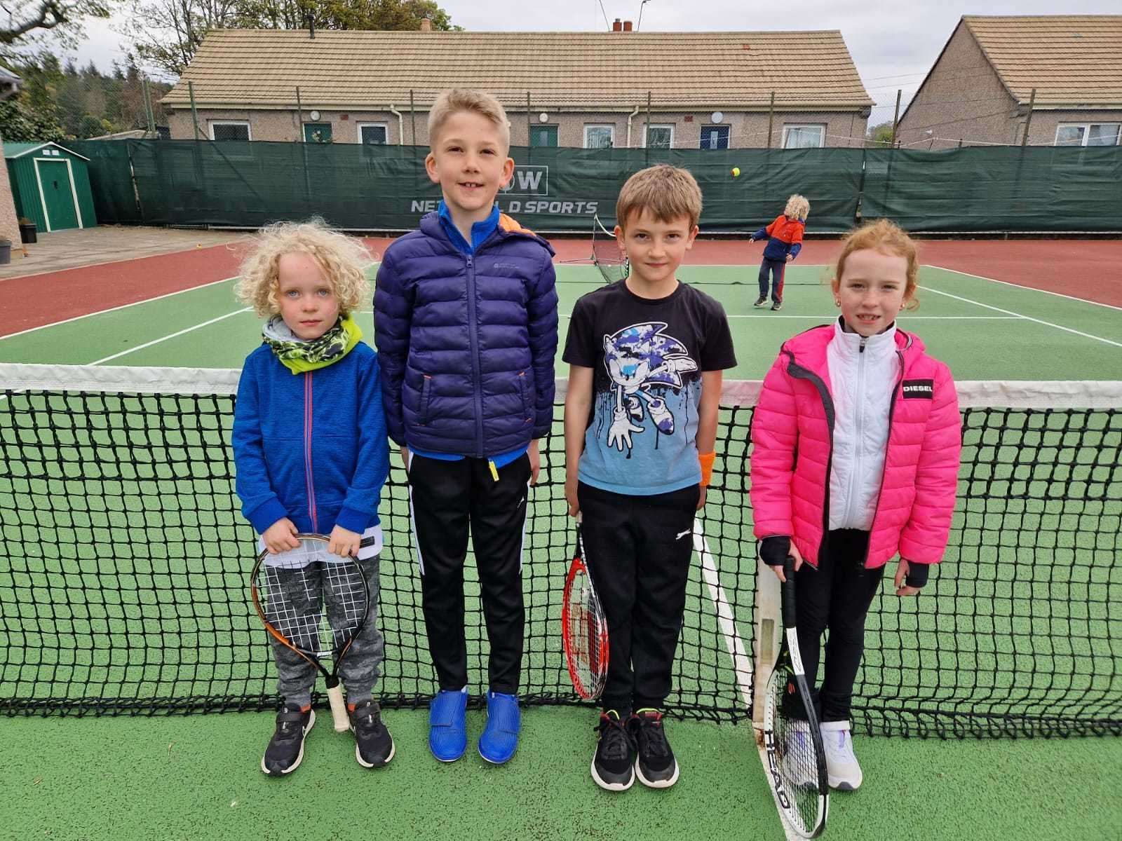 Forres tennis Club's 8-and-under juniors who won both matches last week, from left: Byron Johnson, Harris Hepburn, Rhys Forwood and Isla Fielding.