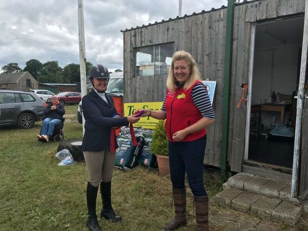 Avril Johnston, Novice winner, with Jane Clark, a member of the Burgue BE Committee.