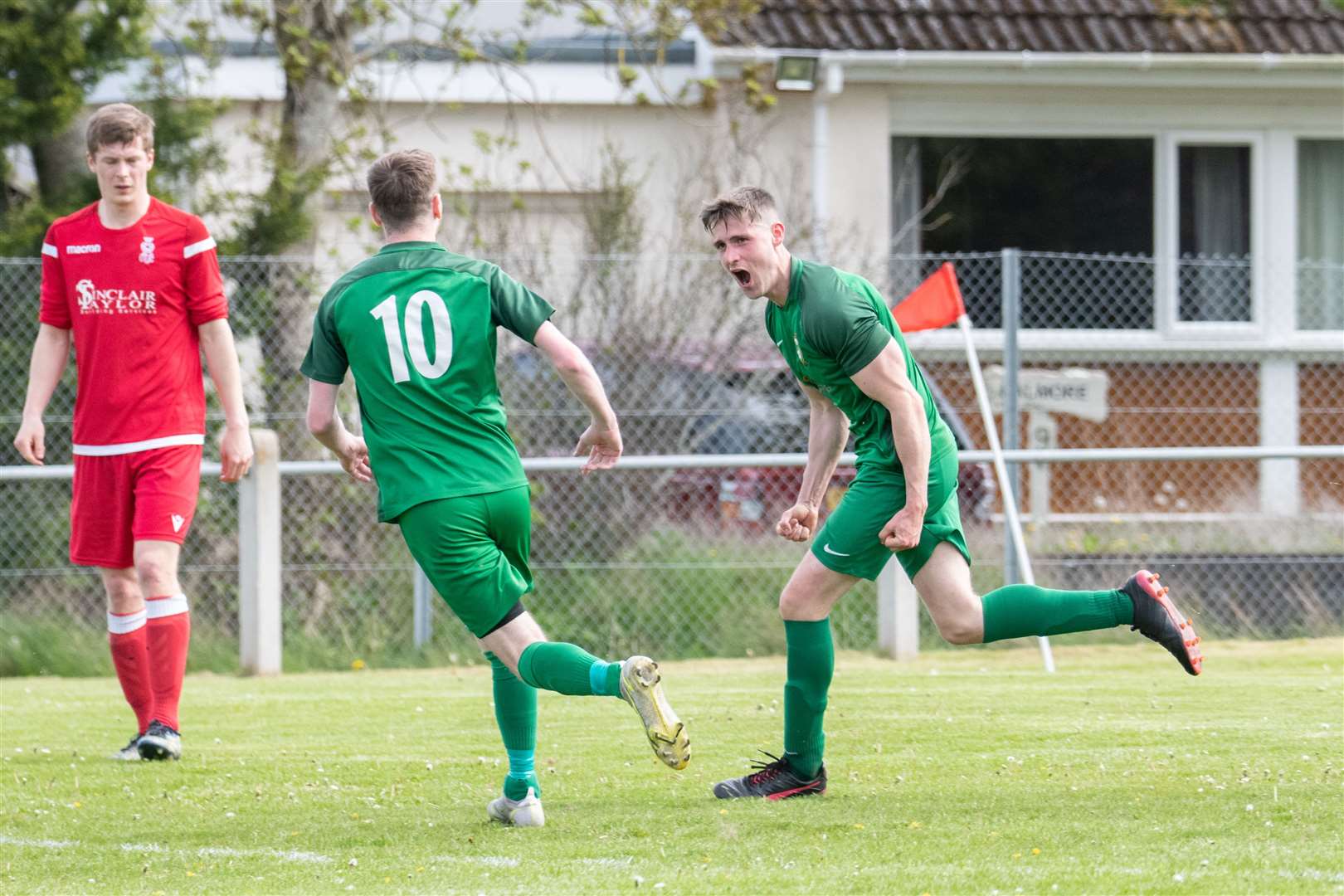 Finlay Stables roars with delight after putting Dufftown ahead in the second half...Dufftown FC (2) vs Forres Thistle FC (2) - Dufftown FC win 5-3 on penalties - Elginshire Cup Final held at Logie Park, Forres 14/05/2022...Picture: Daniel Forsyth..