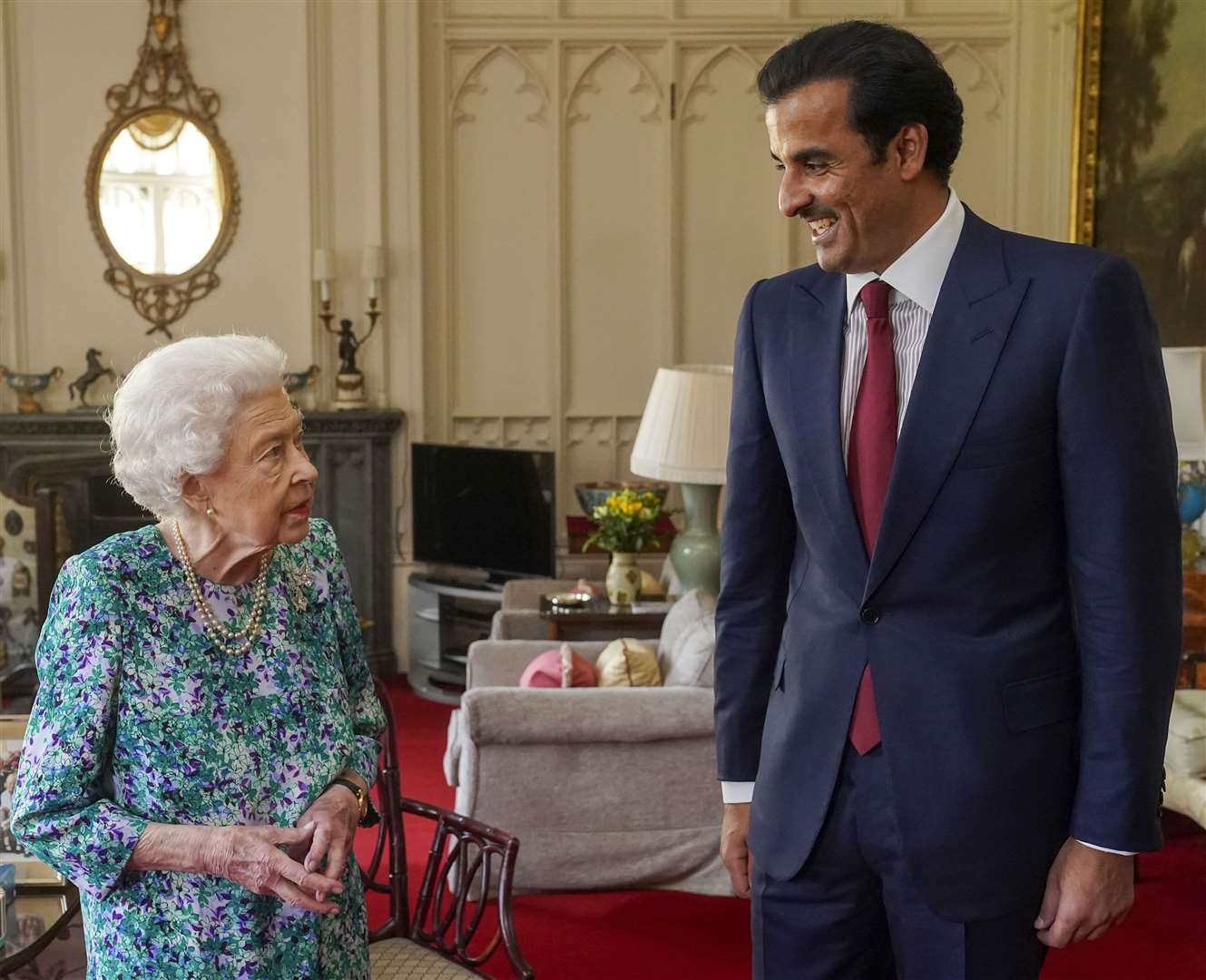 The monarch chatting with the Emir of Qatar, Sheikh Tamim bin Hamad Al Thani at Windsor Castle (Steve Parsons/PA)