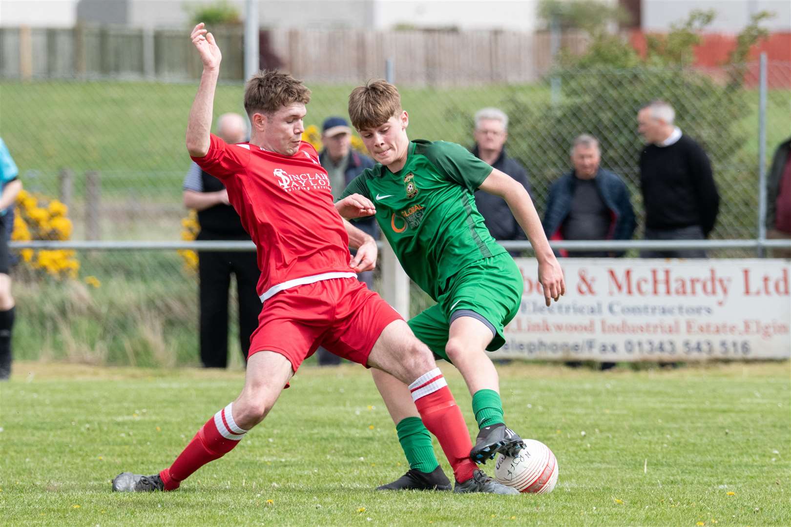 Forres Thistle's Ross Paterson and former Dufftown player Aidan Cruickshank. Picture: Daniel Forsyth