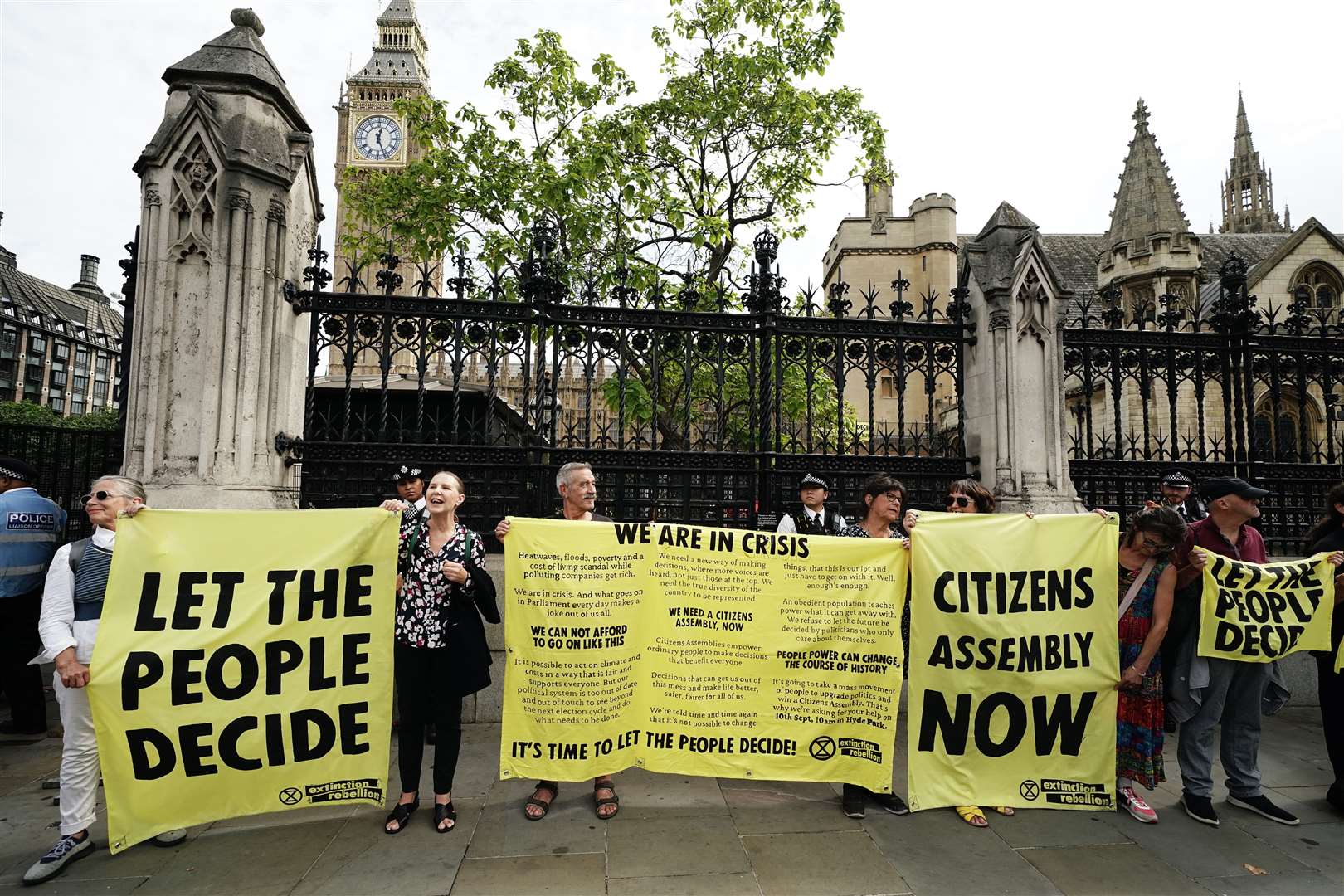 Extinction Rebellion protesters outside the Houses of Parliament, calling for a citizens’ assembly (Aaron Chown/PA)