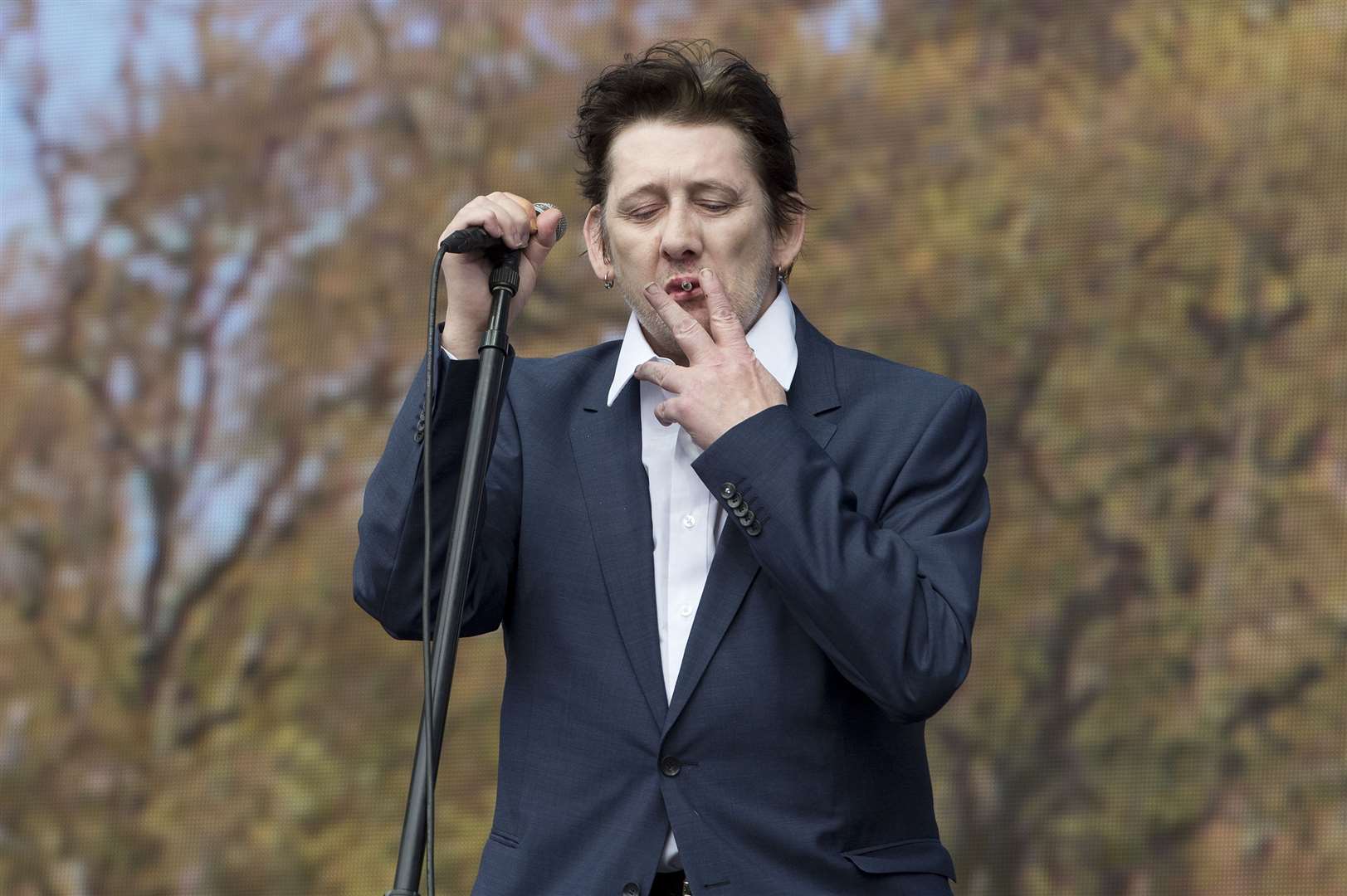 Shane MacGowan lead singer of The Pogues as the band performs at the Barclaycard British Summer Time Festival in Hyde Park, London (Laura Lean/PA)
